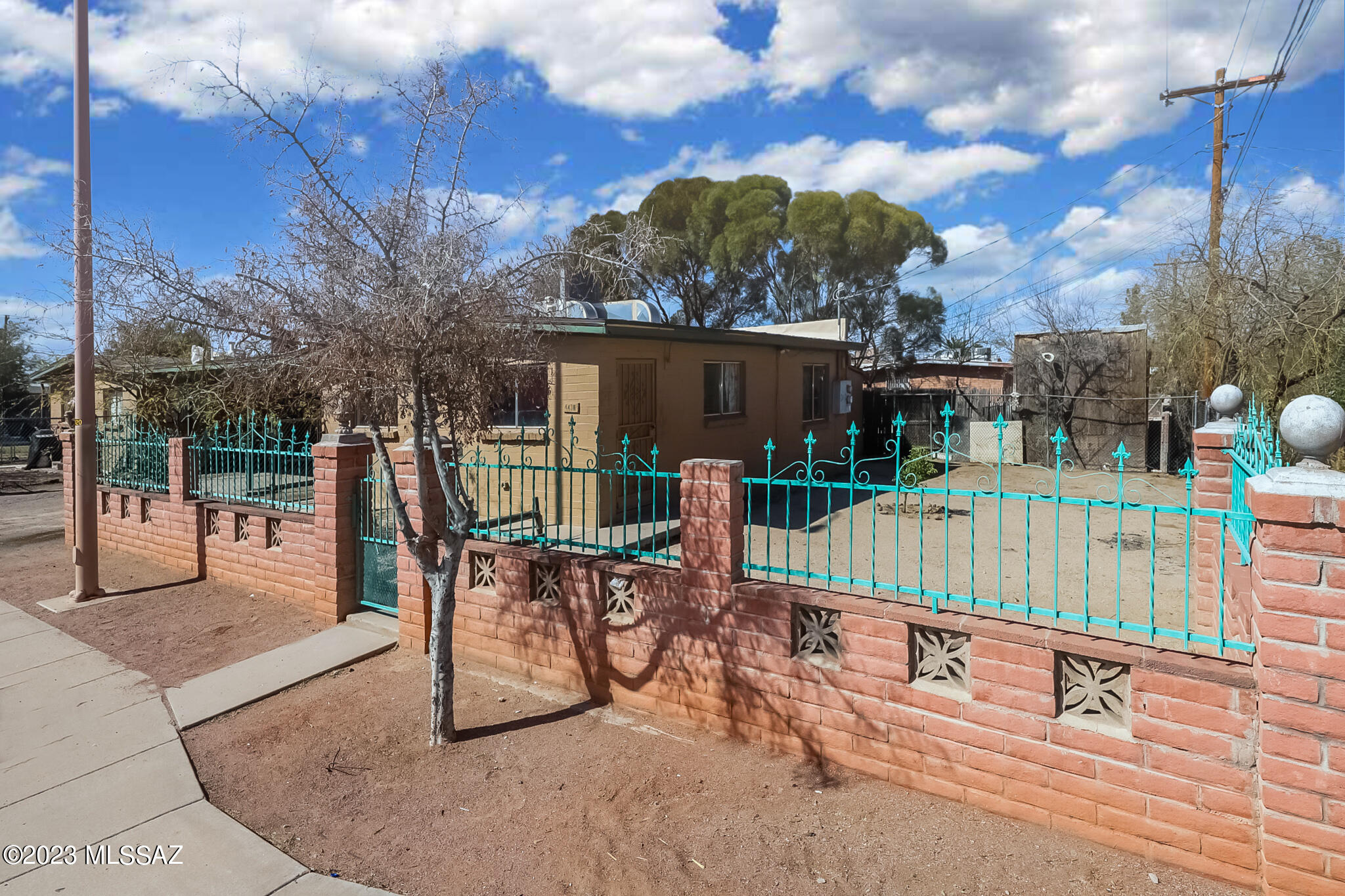 Well maintained, newer duplex in convenient location. Carport plus extra on site parking, enclosed yard. A/C recently replaced. All block construction, units are separated, no shared walls. Both units are 2BD/1BA, one is currently occupied by a long term tenant, other is vacant (796 sq ft ea), both units have been continuously rented (unit that is currently vacant was occupied until Nov 2022). Current rent of $700/mo is well under area's market rate of $1,200/mo. Great income property or live in one, rent the other.  Separate meters for each unit. Won't last long. Convenient to schools, shopping, transportation, I-10 & I-19.