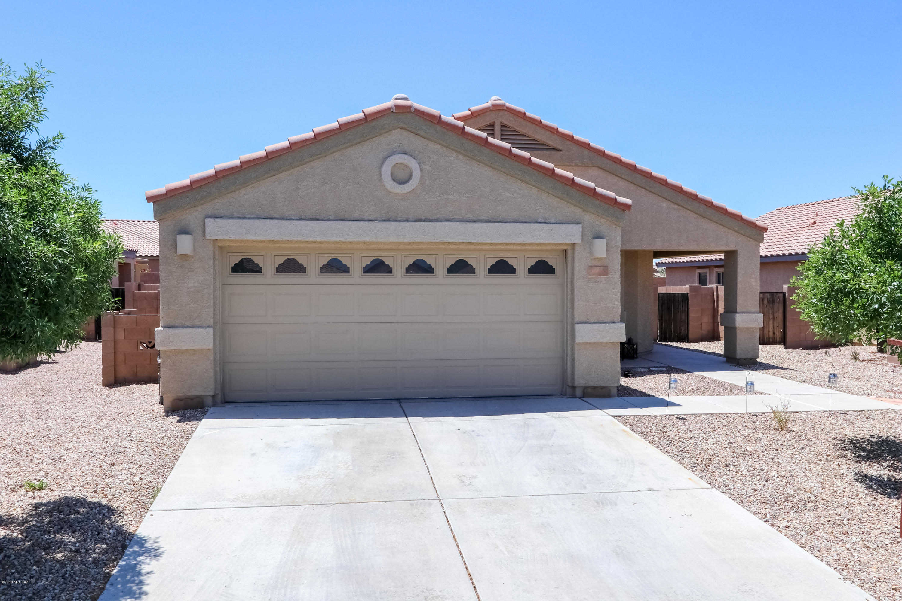 Presenting a beautifully updated 3 Bedroom, 2 Bathroom and 1,328 square foot home in Gladden Farms with original owner. This home has been meticulously maintained throughout. It features an open concept with a split bedroom floor plan. Kitchen and bathrooms have Corian countertops so no lines anywhere for easy cleaning. Gorgeous ceramic tile everywhere but with recently replaced carpet in bedrooms. High quality wood blinds throughout home keeping the windows looking nice and private. Mature landscaping from front to back for easy maintenance with a bonus playground and garden to grow fresh produce right from your own backyard. Groves community park just steps away from home. Make this your new home and enjoy the peace of mind of a very well taken care of home!