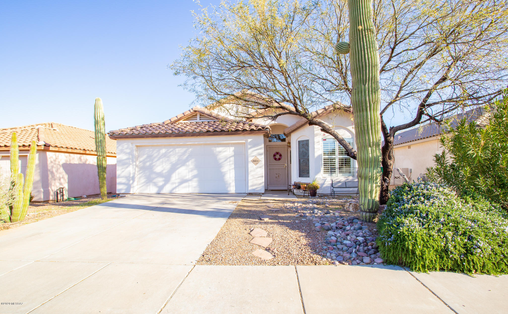 PRICE JUST REDUCED! Beautiful home in the desirable Dove Mountain Community. With 1631 sq ft of living space, this  home has 3 bedrooms, 2 bathrooms, family room with fireplace, and large backyard with covered patio great for entertaining. Spacious kitchen with plenty of cabinet space, stainless steel appliances, breakfast area & formal dining area. Master bathroom with dual sinks and walk-in closet. Located close to I-10, shopping, restaurants and much more!