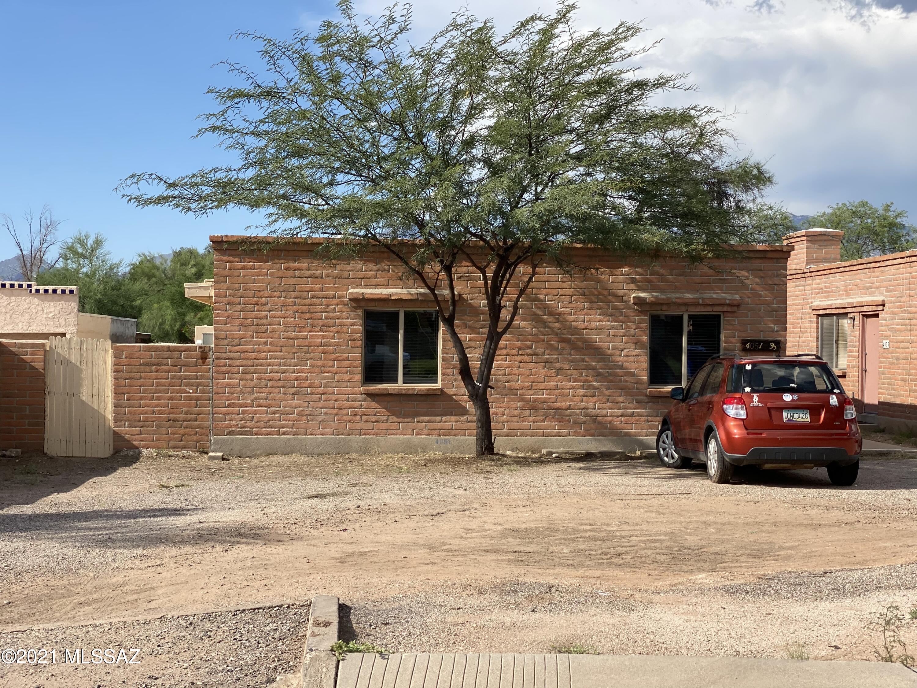 (Must qualify excellent credit and monthly income 3x rent amount needed) remodeled 2 bedroom 1 bath in a Duplex. Private Fenced yard and in central Tucson.  Laundry / storage room. ceramic tile floors. Brand new kitchen counters and tops , New stainless appliances , Central AC, Remodeled bathroom. Freshly Painted. New Dual Pane windows, New exterior and interior doors. This is the unit you have been searching for. Applicants must qualify . Tenants to Verify schools and any other information deemed important. Owner pays up to $75.00 water, sewer and trash monthly.