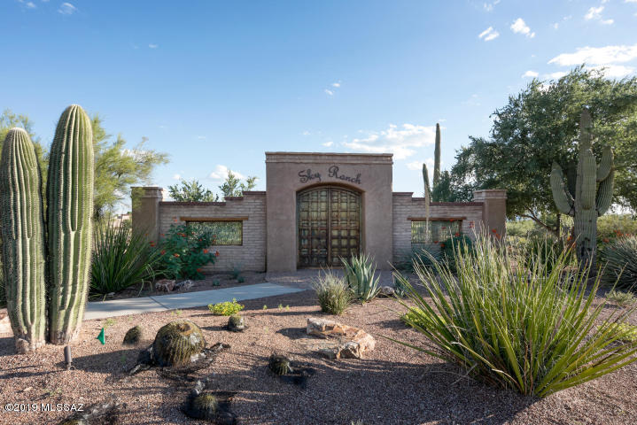 Build your dream home right here in the coveted, prestigious gated community of Sky Ranch. Cul-de-sac lot boasts mountain views nestled in the desert surrounded by custom homes ranging from 550K to 750K. Overlooks 100s of acres of green space, with this lot backing to green space. Build as much or as little house as suits you. Suggested floor plans attached under documents tab, or builder can design to your needs. You cannot do better than this with public water, sewer and gas for your fantasy home. Everyone wants to live in Sky Ranch.