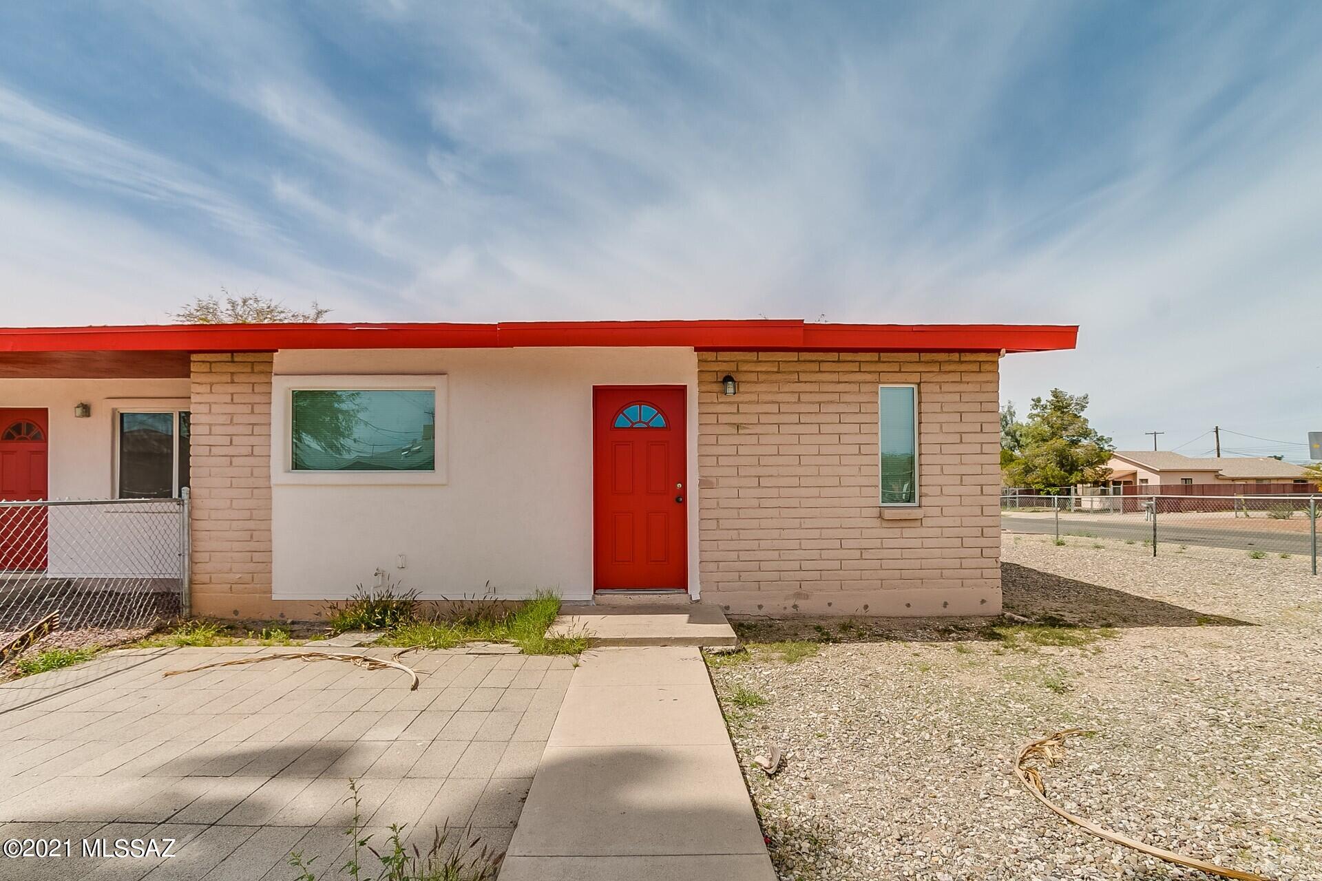 Great opportunity to own an income property near the University of Arizona with two 3 bedroom, 1 bath units and one 2 bedroom, 1 bath unit. Carports and laundry hookups for each unit. The laminate floors makes for very easy cleaning and maintenance, and the full tile shower surround adds a comforting touch. Central air conditioning and heat provide year round comfort here in the Tucson desert. No showings until an offer has been accepted.