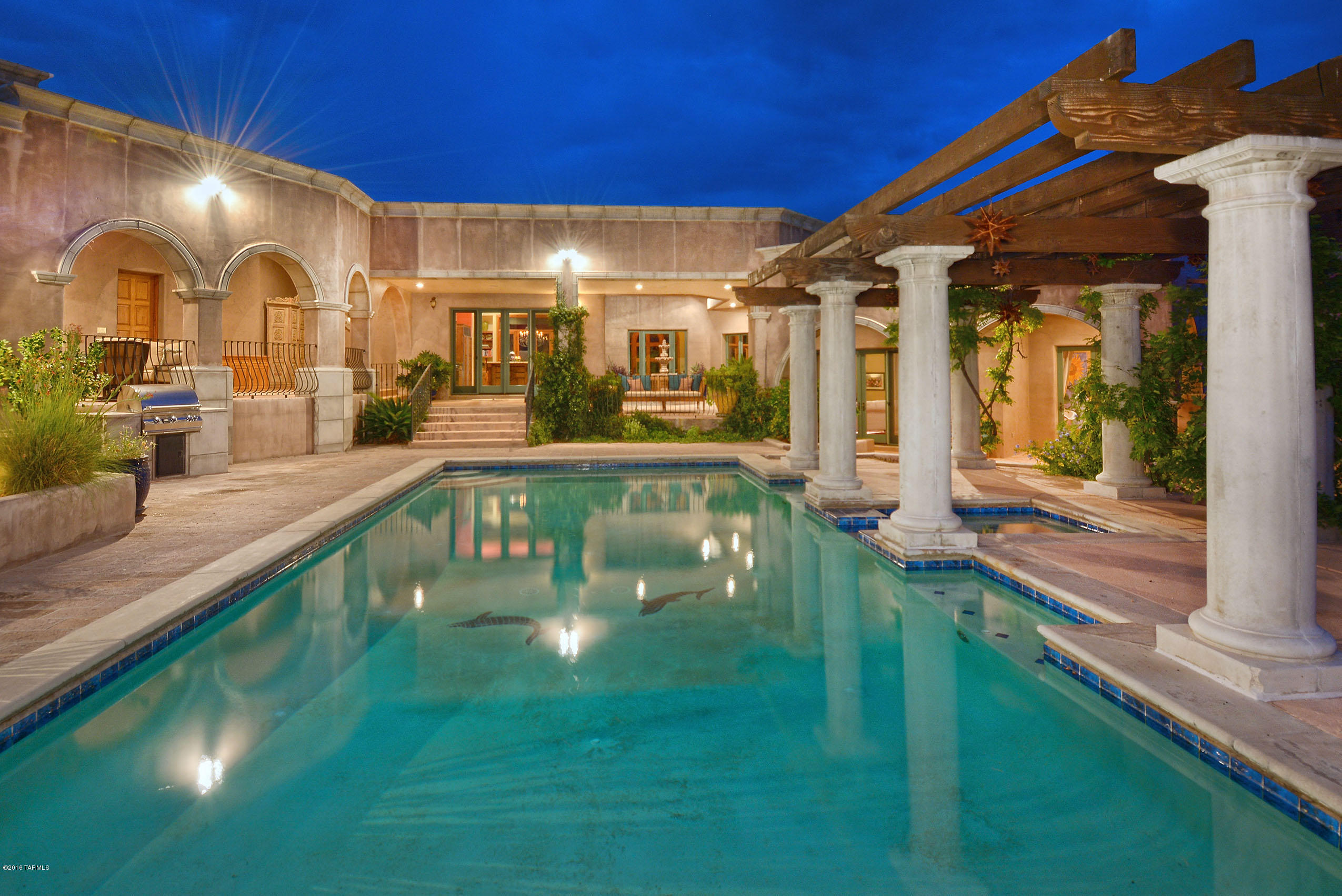Exquisite Mediterranean masonry custom home nestled on 1.11 manicured acres complete with mountain views. Enjoy the modern amenities and updates while maintaining old world charms. Spacious split bedroom floor plan includes soaring ceilings w/ gorgeous wood beams, 3 separate zoned HVACs, hard wood floors in master and stained scored concrete, solid alder wood doors, custom handmade bathroom vanities, premium Douglas Fir Loewen windows, 4 masonry fireplaces, attached 3 car garage/storage and separate guest house (857 SqFt). Luxurious private outdoor living w/ covered patios, pool, spa, barbecue, fountains, putting green, finished in pavers, outdoor fireplace and ample room for entertaining. Culinary artist’s kitchen w/ granite counters, handsome custom cabinets, 6 burner gas stove, 2 oven Priced below the "Zestimate" value.  Sellers are re-coating the roof (it will have a 5 year warranty), re-staining all the arbors, re-painting all of the  wrought iron on the front of the house and the back porch, and re-finishing the front door.

Many updates and features, please see attached floor plan and additional features list under documents in MLS.  Main house is 3821 Sq Ft, Guest House 857 Sq Ft (with bathroom), Garage 1737 Sq Ft and 1296 Covered Patio Sq Ft.  Come see for yourself today, enjoy La Paloma Estates living.