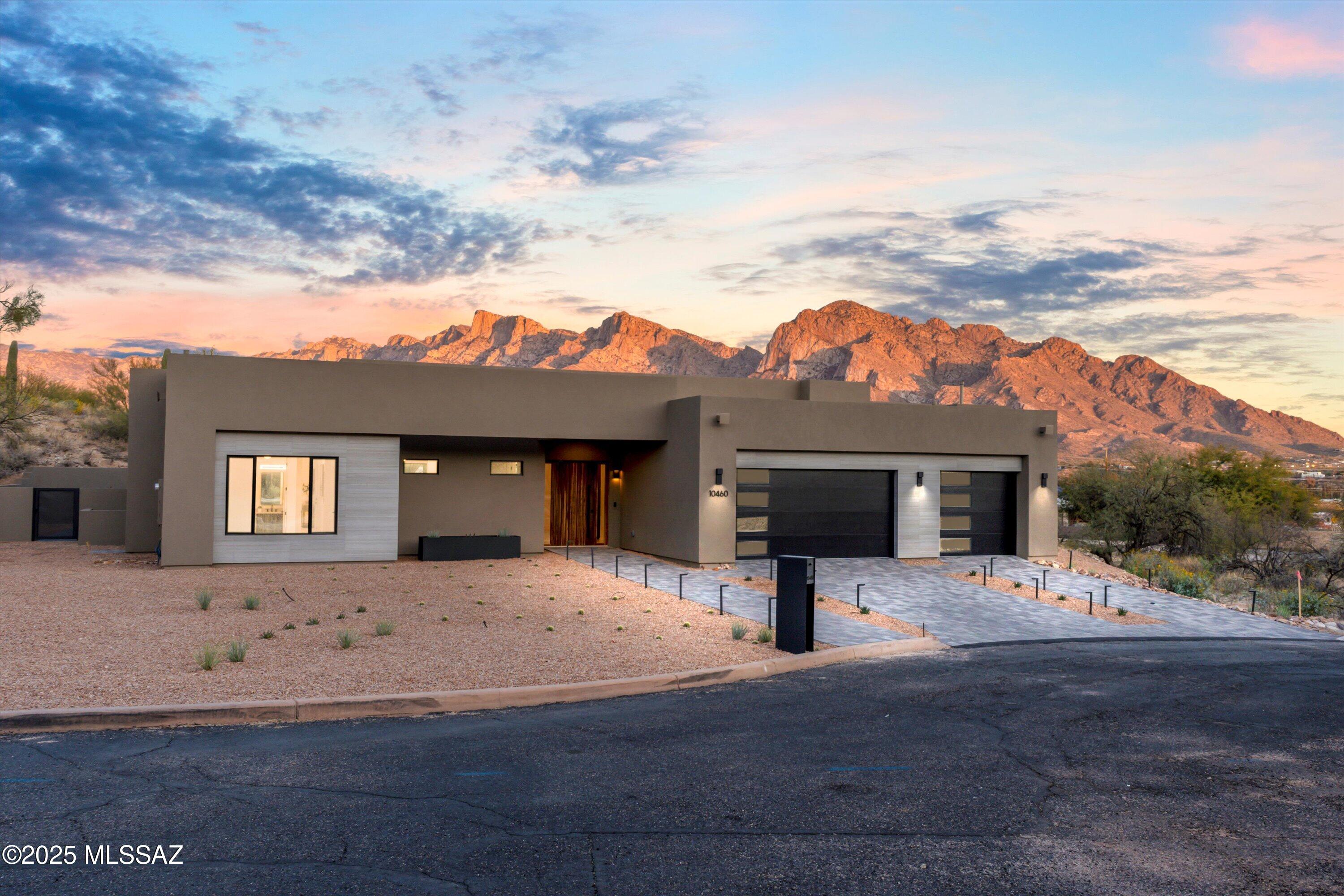 Seller will  accept counter offers between $1,350,000- 1,470,000. Experience the allure of this exquisite contemporary new construction, situated in the prestigious gated community of Canada Hills Estates. Tucked away on a serene cul-de-sac, this remarkable home encompasses 3,504 sq. ft. With 4 generously sized bedrooms, 4.5 opulent baths, an office, and a bonus room, it is thoughtfully designed for modern living. The sophisticated interior features 24x48 porcelain flooring and impressive 11' ceilings, creating a spacious and airy ambiance. The expansive great room effortlessly flows into an extended covered patio, providing ultimate privacy while overlooking the inviting pool. This outstanding property harmonizes luxury, comfort, and elegance, making it an ideal retreat.