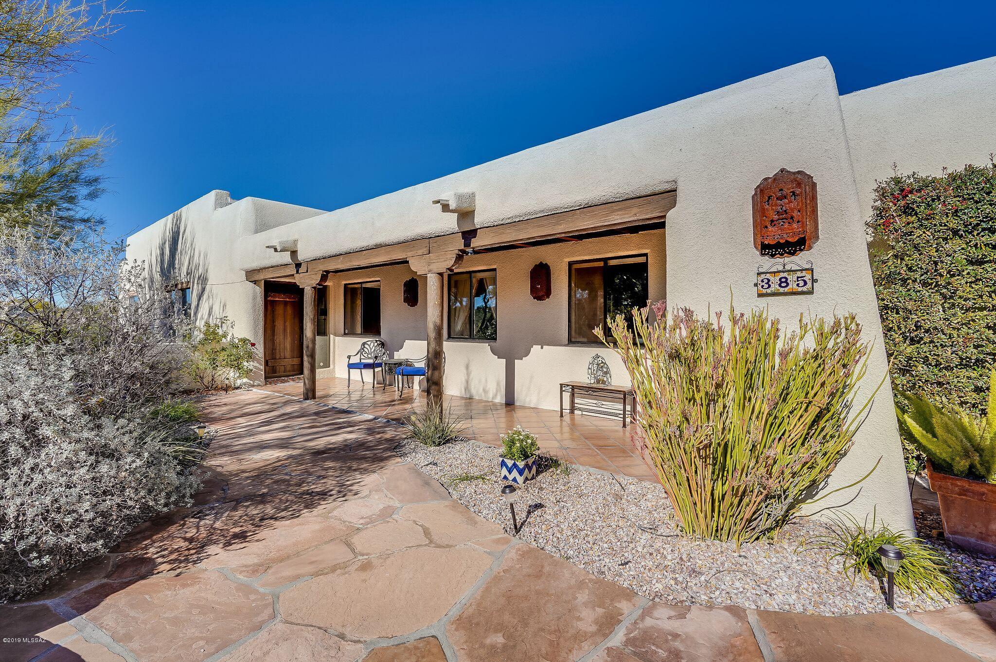 Range Price...Seller will accept or counter any offer within the range.
Stunning Santa Fe with incredible views! Beautifully maintained home that is waiting for the perfect buyer.
A cook's delight kitchen w/marble & mahogany countertops. Custom Alder Cabinets, dual fuel range, built-in refrigerator.  Hand scraped hardwood floors compliment the Manganese Saltillo tile floors. Relax by the sparkling solar heated pebble tec pool and gaze at the stunning mountain views. This Private and Serene home is on over 3 acres.