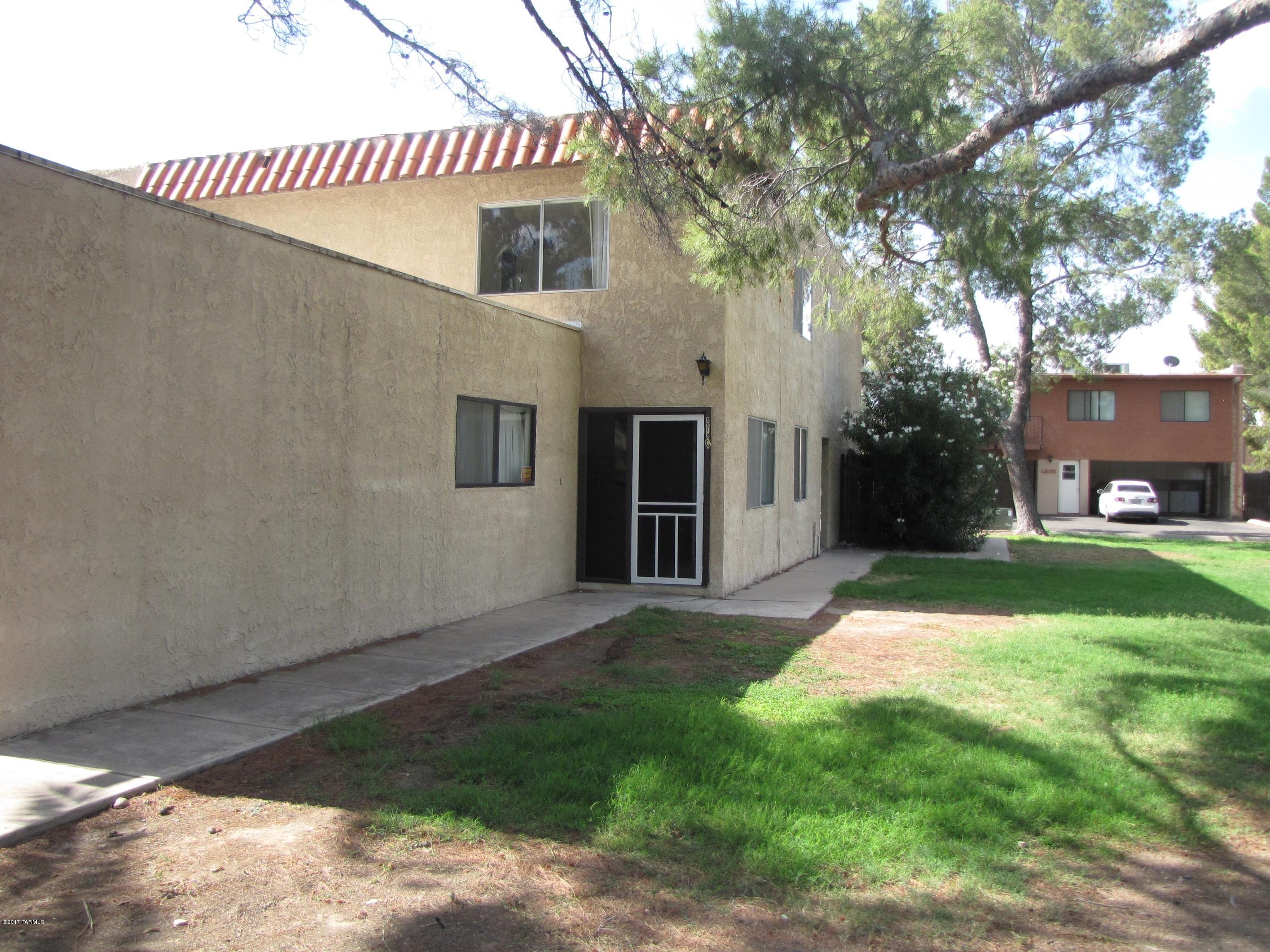 2 story upstairs spacious 2 bedroom unit conveniently located near restaurants, shopping, entertainment, outdoor activities.  Unit features new carpet, fresh paint, spacious bedrooms, open kitchen to living room.  Some storage in carport. Community has a park feel setting.