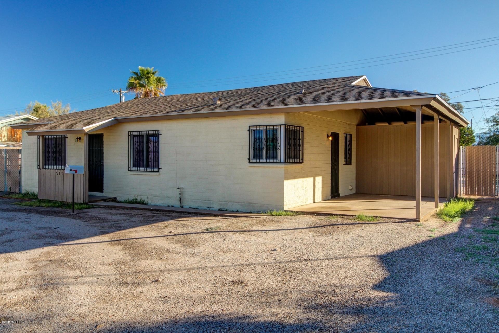 Extremely well taken care of home right in the middle of town. This 2bedroom/1bath  has all the right upgrades for you to move right in and call your very own. within the last few years the seller has added New Flooring, New Electrical Panel, Fresh Paint on the Exterior and Interior,New Garbage Disposal,New Gas Stove,New GFI's in Kitchen/Bathroom,New Facet and Water Lines below sink in Bathroom,Toilet Replaced,New door handles and some of the light fixtures replaced, NEW ROOF back in 2013,Triple Pane Windows installed, water line from meter to home replaced, and last but not least, water line from home to alley sewer replaced. Lets not forget to mention the large storage space off the carport and walking distance to tons of restaurants and shops in the area.