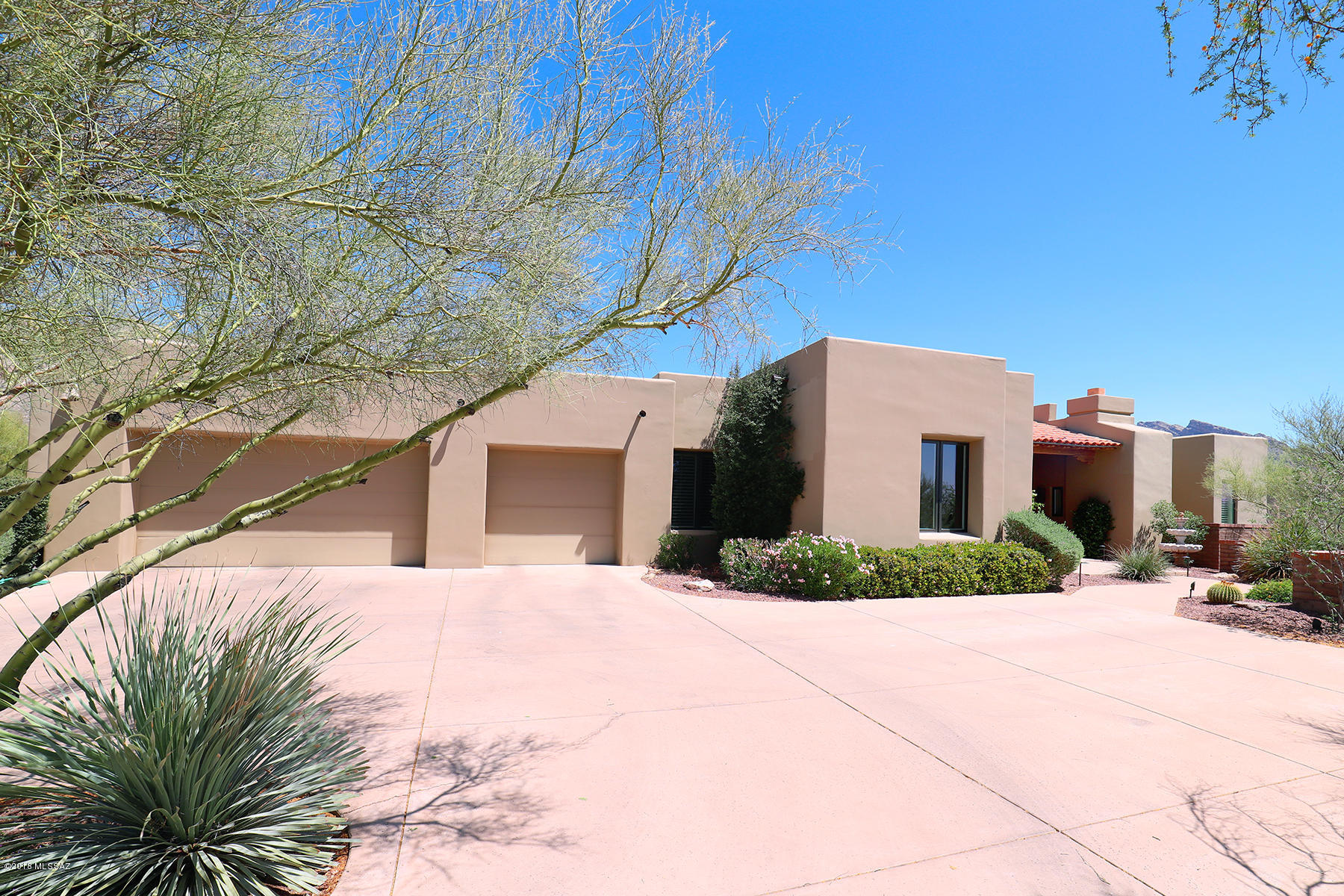 Outstanding soft contemporary built by premier builder, William Diamond, showcases unobstructed sweeping mountain views as you enter foyer.  Located in prestigious gated Pima Canyon Estates, this 3,920 sq. ft., 4 bedroom split plan with ensuite baths plus den offers the perfect sense of scale and proportion.  Fully appointed kitchen with SS appliances, granite counters and tranquil outdoor living spaces inspires effortless entertaining with a perfect flow between living areas.  Updated master suite and bath has dual walk-in closets, soaking tub, alder cabinets and natural stone counters.