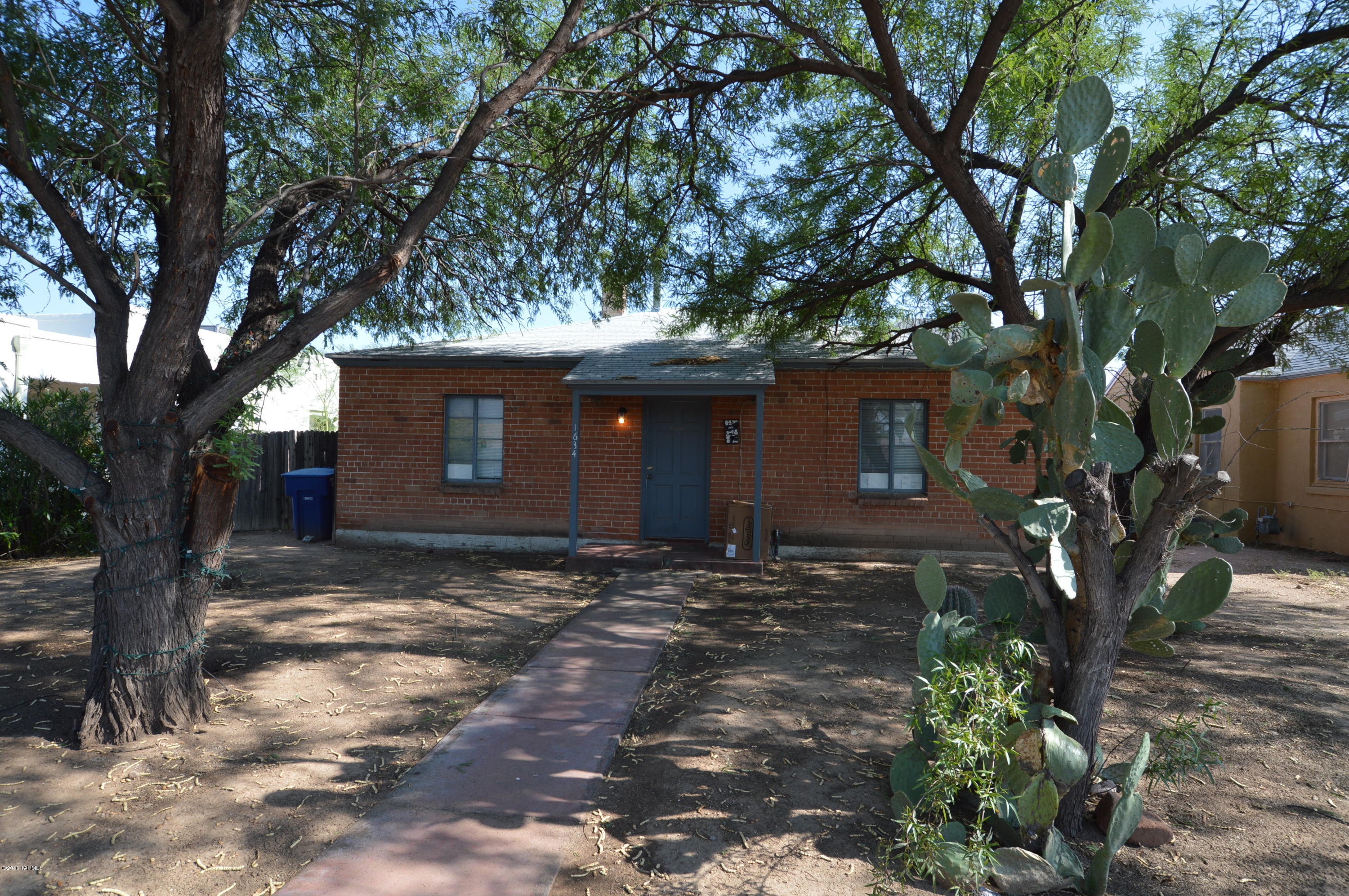 Adorable and gorgeous 3 BR home! Easy walk to U of A and UMC! PERFECT for students or UA employees! Easy clean tile throughout. Great kitchen. Charming brick construction for cool comfort! Covered patio perfect for outdoor entertaining! HUGE fenced yard perfect for kids or approved pet! Detached garage. CALL TODAY and schedule your appointment!