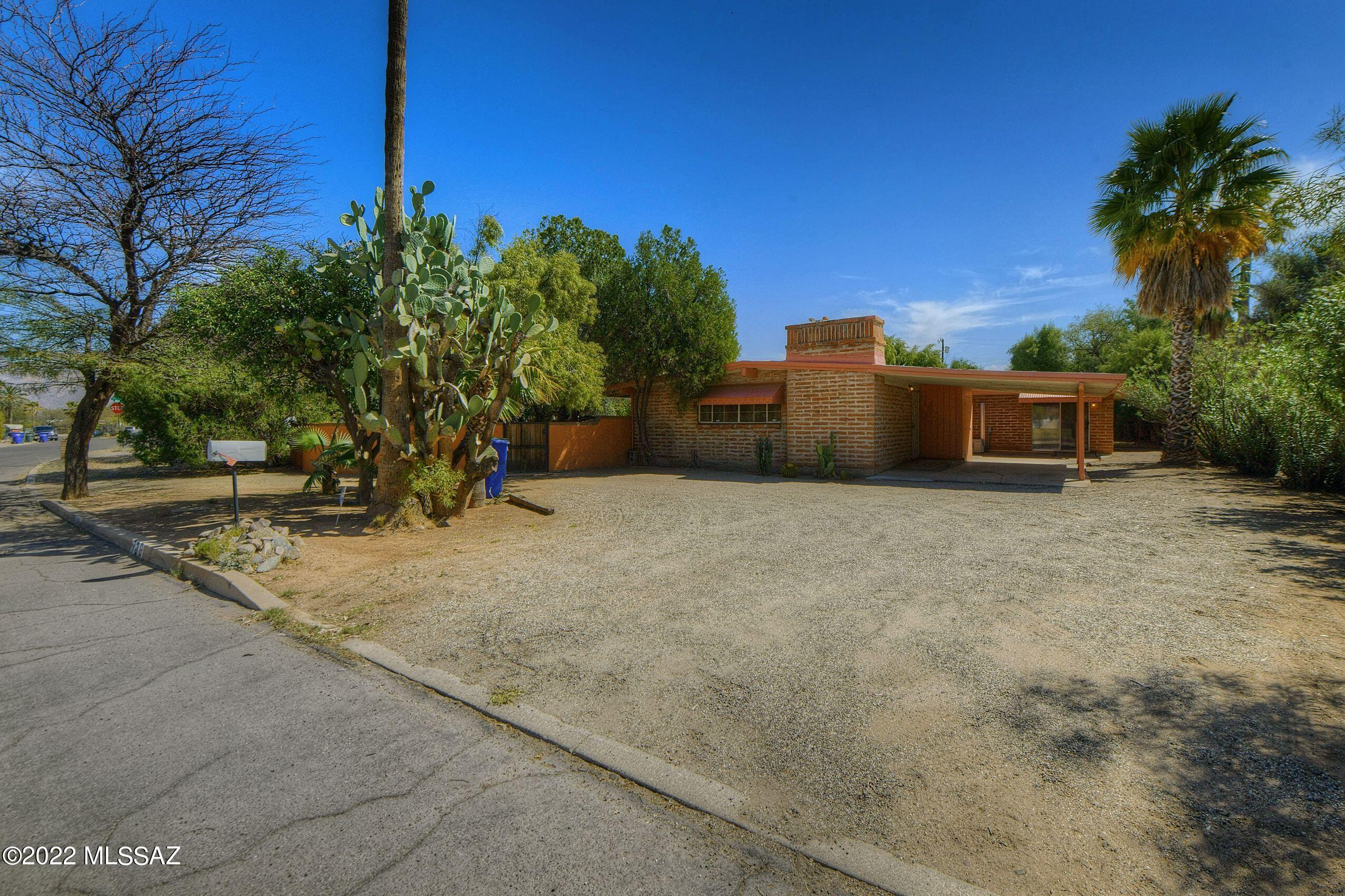 This classic adobe home in the heart of central Tucson is the perfect fixer upper. It has 3 bedrooms with an suite full bathrooms. One is ADA compliant with a fully wheelchair accessible shower. Out door space is perfect for entertaining or just relaxing. Previous owners were both artists who utilized the two large work shop areas to create art. Centrally located, it is conveniently located by shopping, restaurants and University of Arizona.