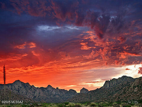 Discover Your Slice of Paradise at Dragoon Mountain Ranch! Welcome to Dragoon Mountain Ranch, a breathtaking sanctuary nestled in the foothills of the historic and scenic Dragoon Mountain Range. This 14,000-acre gated community offers an unparalleled opportunity to create your dream retreat, with 36+ acre lots available for you to design your personal oasis amidst the stunning Arizona landscape. Dragoon Mountain Ranch offers the best of both worlds: a tranquil retreat in nature while being conveniently located near St. David, Benson, Tombstone, and Tucson. With good schools, healthcare, shopping, and entertainment a short drive away, you'll have everything you need within reach. Experience peace of mind in this exclusive gated community,  PRIVATE WELL AND HOLDING TANK!