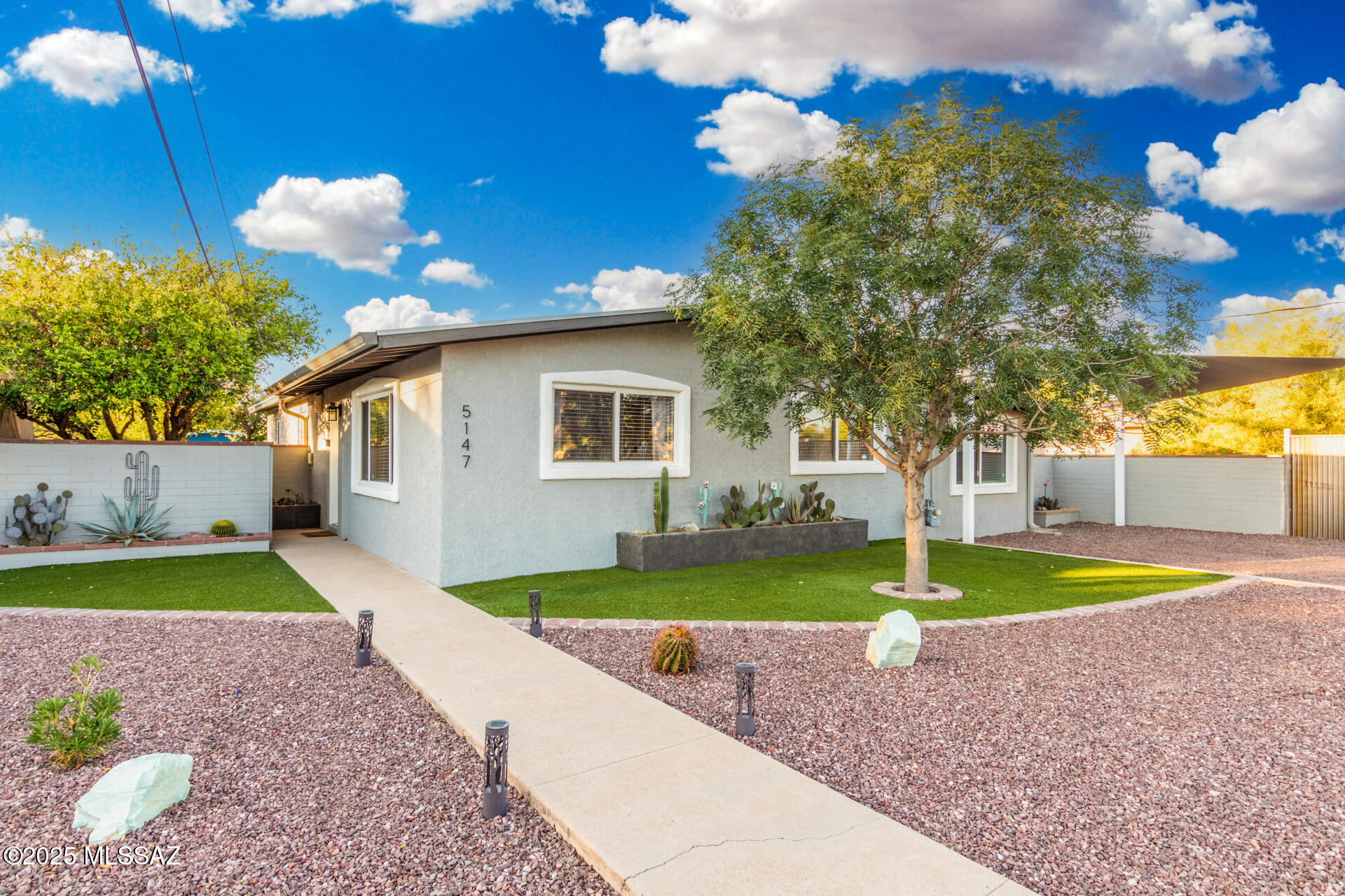Discover this super cool & truly unique ranch-style gem in central Tucson! Bursting with charm & character, this 4 bed, 2 bath home has been beautifully renovated & sits on an expansive lot with stunning mountain views & a SPARKLING POOL—your own private oasis. The flexible 4th bedroom offers a separate entrance, perfect for a GUEST SUITE, RENTAL or OFFICE. The backyard is a dream with a he shed/ she shed, including a WORKSHOP for creative projects or extra storage. Inside, you'll find stylish finishes, tons of natural light, & modern updates that blend seamlessly with the home's original personality. Located close to shopping, dining, parks, & just minutes from the University of Arizona, this one-of-a-kind property is a rare find in a fantastic location! NEW HVAC ('24) & NEW ROOF ('23)