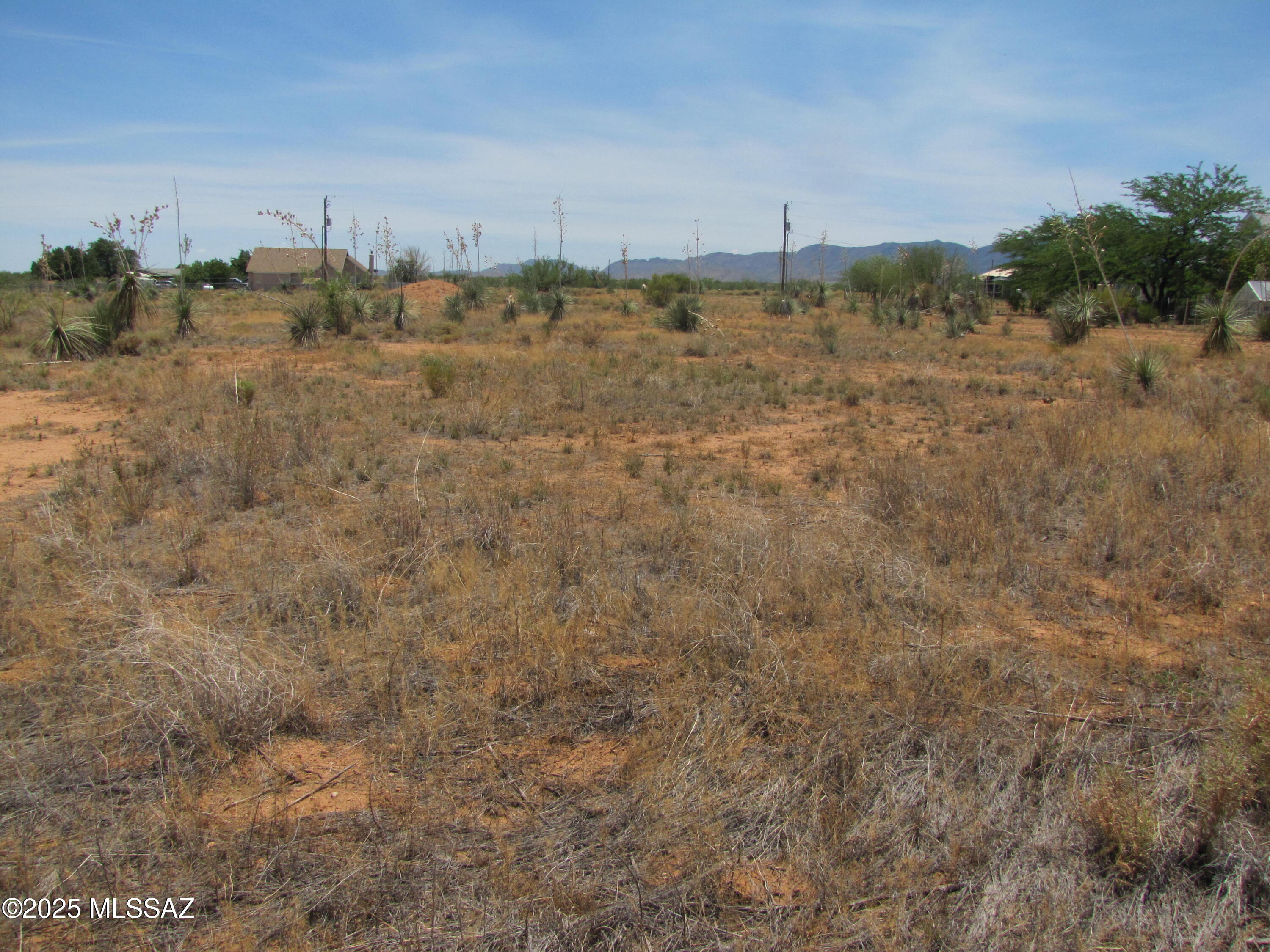 Located on a COUNTY MAINTAINED road, this 0.85ac parcel has SEPTIC installed already!. Water from local water company is AT THE LOT LINE! Bring in electric or solar then built your dream home. Just a little more than 1 mile to paved roads, with easy access to Hwy 191 and I-10. Only a few minutes from the friendly village of Sunsites with its amenities. And don't forget the view of Cochise Stronghold in the Dragoon Mountains and starry nights.