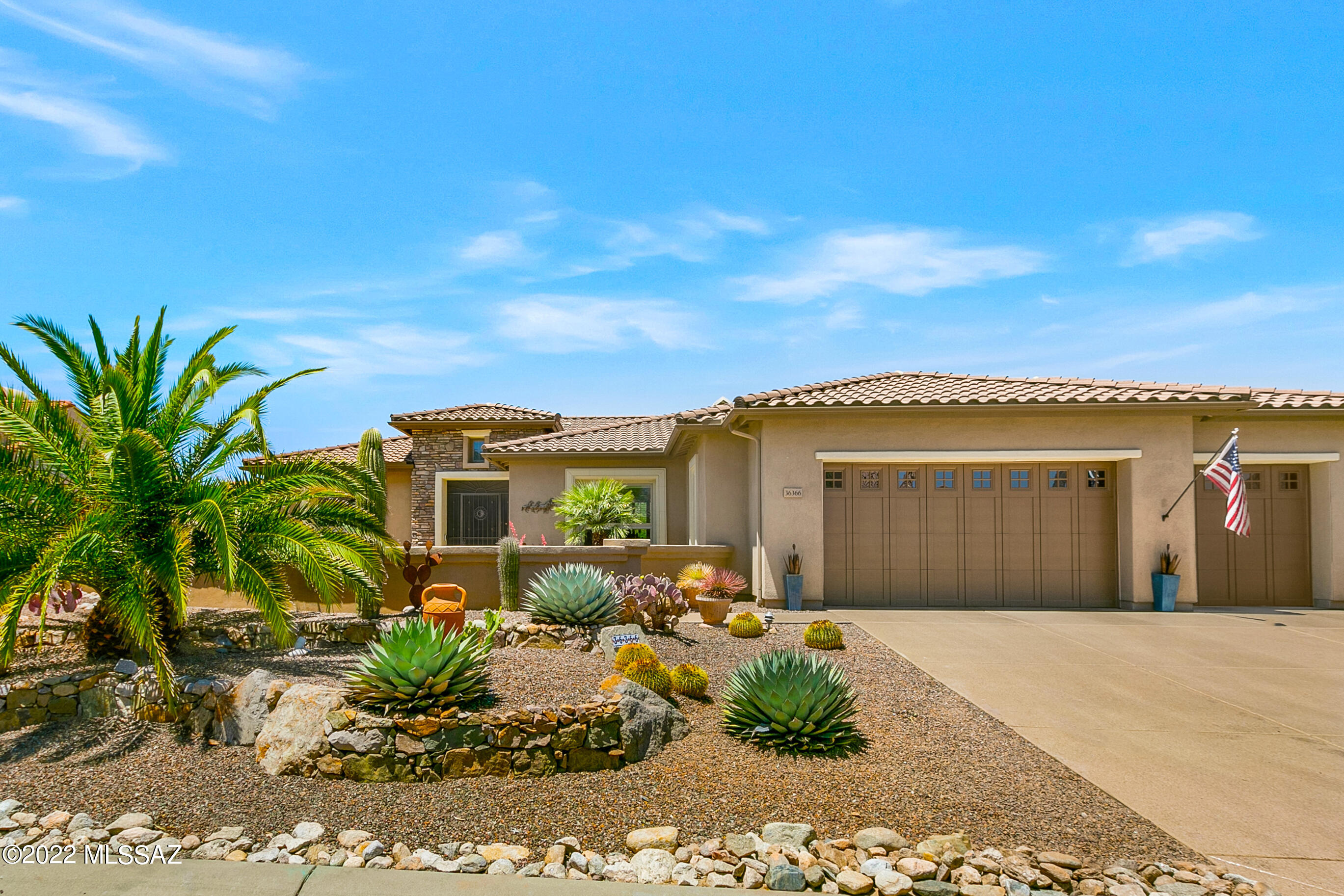 Southwest inspired design is warm and inviting. Beautifully furnished & appointed you can buy this home  TURNKEY and start your resort living NOW! Located in The Preserve with lovely mountain views, this Sabino plan is ideal for easy living. The central great room features 12 Ft. coffered ceiling with a custom designed built-in media center. Interior doors are 8 ft. solid Alderwood. Recent upgrades include a remodeled master shower, closet organizers, interior paint, nest thermostats, new Bosch refrigerator, new sink, faucet and disposal.  Other additions include a water pressure pump, water softener, courtyard entry gate and 3 security doors. Beautiful & mature landscaping adds to the charm of this special property.  Nice quiet street with no through traffic. Cabinetry throughout is knotty cherry wood.  Granite kitchen counters and back splash. Lower cabinet pull out shelves. Plantation shutters and Hunter Douglas pleated shades. 
Motorized solar screens at large window in Master BR and in guest bedroom.
Quartz counters in master & guest baths.
Double doors on the den. All doors are solid Alderwood. 
6  nightlight outlets.
Flooring is porcelain tile with wood in bedrooms & den.
Garage: epoxy coated floor, new door opener and key pad, LED lighting and a door to the back yard. 
Roll down solar screens on the patio.
2 citrus trees on south side.
Borders desert open space for privacy.