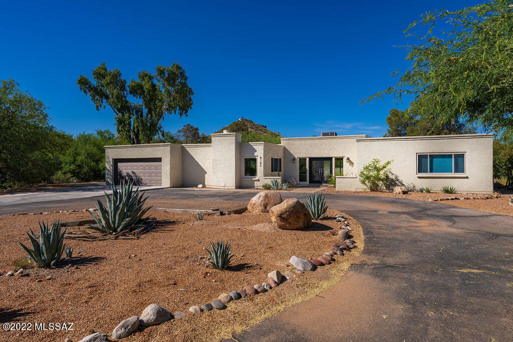 Range Price 750,000-790,000. Location, Location, Location,
This Lovely remodeled home is nestled in an iconic neighborhood amongst the shadows of Sabino Canyon and bordering Hidden Valley. Move in ready, peaceful location, Award Winning District 16 schools. The dreamy kitchen is made for cooking and entertaining with upgraded soft close cabinetry, quartz counters, pendant lighting, 5 burner gas cooktop w/hood, double oven/microwave, French door refrigerator with ice/water dispenser, stainless steel farmhouse sink and huge Island with seating for 4. Separate dining room with original wood beams and gorgeous fireplace. Split floor plan with 5 bedrooms, 3 full baths, including 2 masters with on-suite bathrooms. One master bedroom wing has a separate A/C. Gigantic laundry room w/ Newer washer and dryerand lots of cabinetry for extra storage. The beautiful double entry iron and glass door complete the incredible remodel of this home. Wood like Tile floors throughout. Circular driveway. Open, single-story layout yet offers lots of privacy. Beautiful mountain views and natural desert right out your front door. Yard is fully fenced with stucco wall... very serene and secluded backyard with large, covered patio and beautiful sparkling  pool. Newly installed dual pane windows, newer HVAC system and newer tankless water heater, Ceiling fans throughout, smart lock on front door, 2 smart thermostats, 2 skylights.  Take a walk on the street's recently resurfaced flat roads.... Close to golf, hiking, resorts, upscale restaurants, and shopping.  Bring your RV's and toys.....No HOA