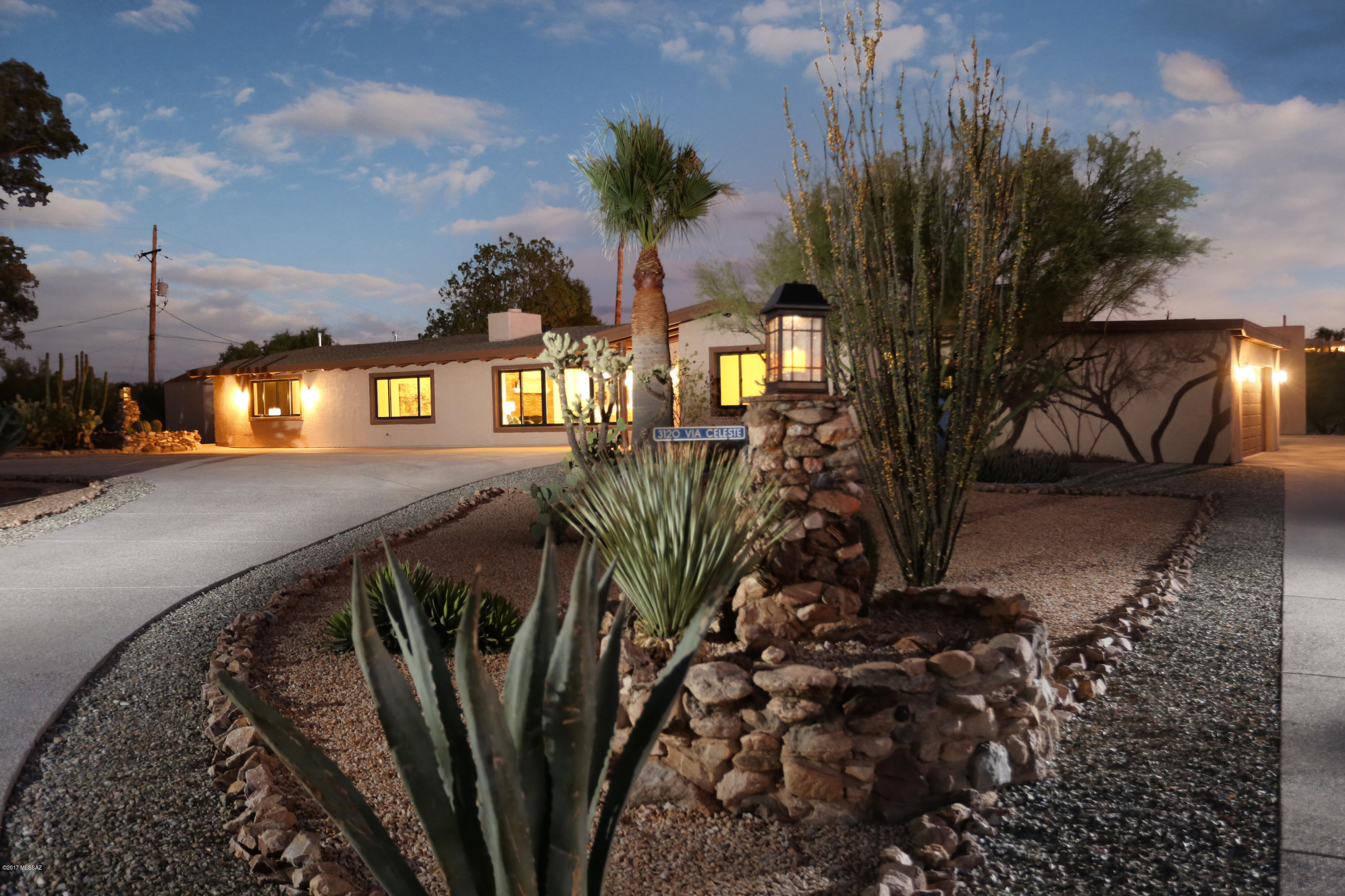 Seller will accept or counter offers between $795,000 & $810,000. Catalina Foothills GEM. This immaculate ranch home is stunning.Every facet of this pristine property set on 2 acres has been completely renovated including a newly built complete guest house with full kitchen and 2.5 car garage/workshop. The result is a beautifully appointed 5 Bedroom, 4.5 bath home with panoramic views. This spacious residence is perfect for entertaining with plenty of parking, an inviting pool and waterfall, a large fire pit, a built in BBQ plus private hiking trails. The stunning master bedroom suite includes desirable sunset finger rock mountain views that are even more magnificent seen through new picture windows. Come and enjoy the peaceful setting and beautiful views of this well designed estate.
