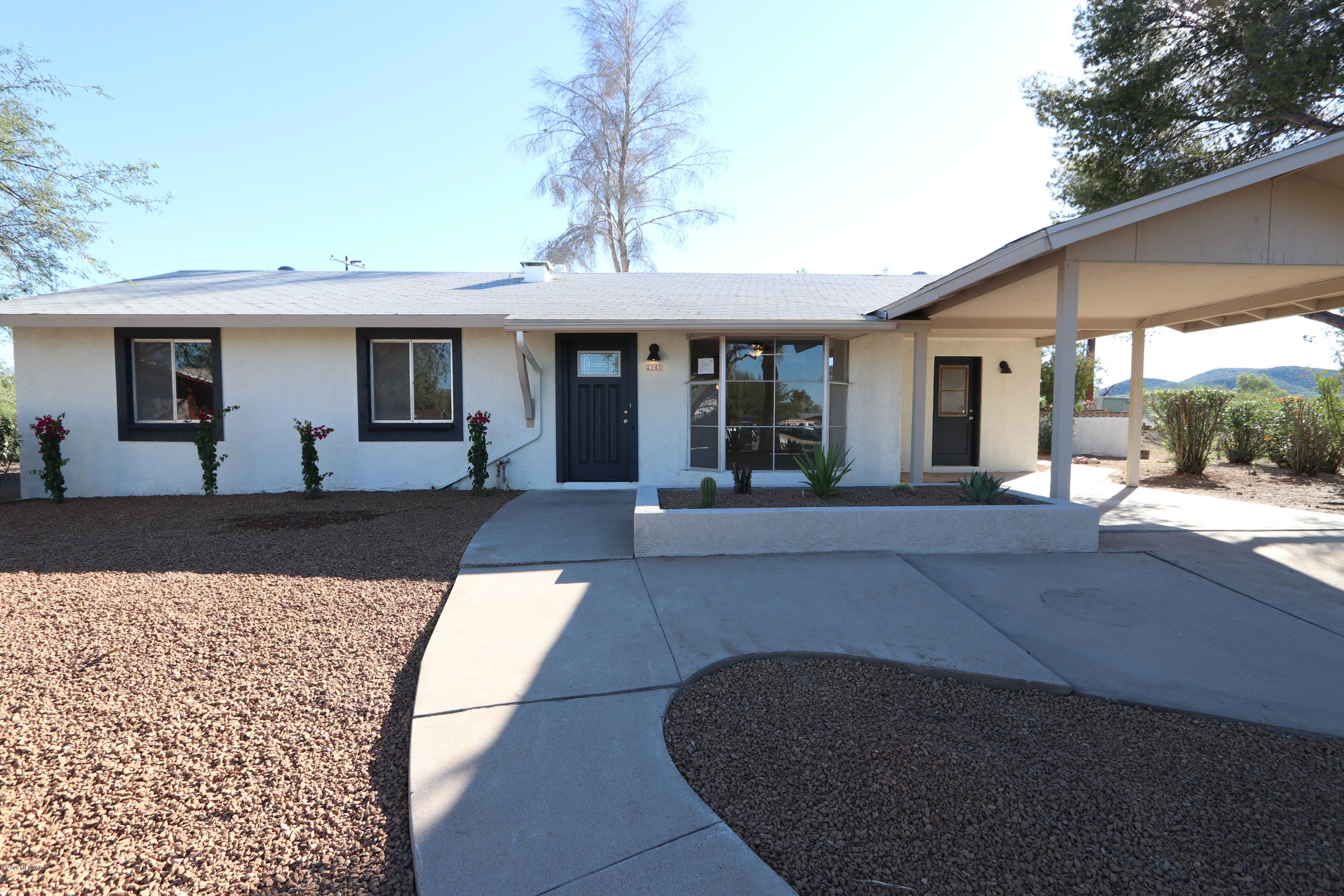 Radiant Ranch home with Bonus Room!  Modern kitchen with stainless steel appliances, contemporary tile flooring and Granite countertops.  Open and bright floor plan, Beehive fireplace,  large windows to let lots of natural sunlight in, trendy tile in bathrooms, covered patio and huge lot with lots of possibilities. Great Westside location. A must see!