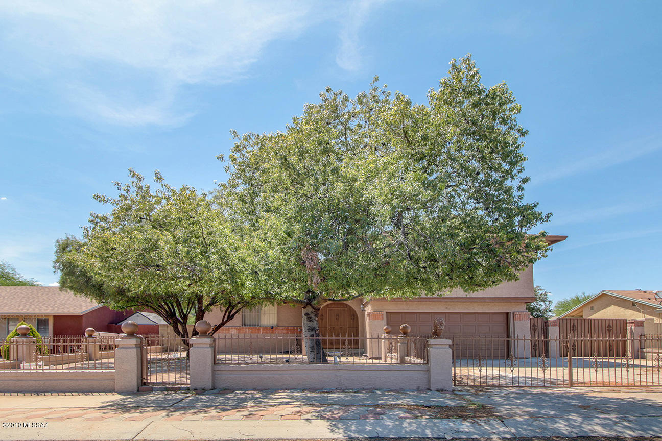Good sized home at approximately 2,430 square feet.  Ex-large master suite with its own sitting area or you decide.  Down stairs you will find an extra room for family room, exercise, hobbies or rec room.  Energy efficiency with two Master Cool evaporative coolers for Springtime use besides A/C.  Just in time for Summer, this boasts a Pebble-Tech pool and spa.  Roof is approx. 3 years old and water heater just 9 months old.  Electrical currently being upgraded to 200 amp service.  Painting  includes total outside coverage, fence and pool deck too.   This one is priced so that you can update and do your floors of choice.  Lastly, no HOA.