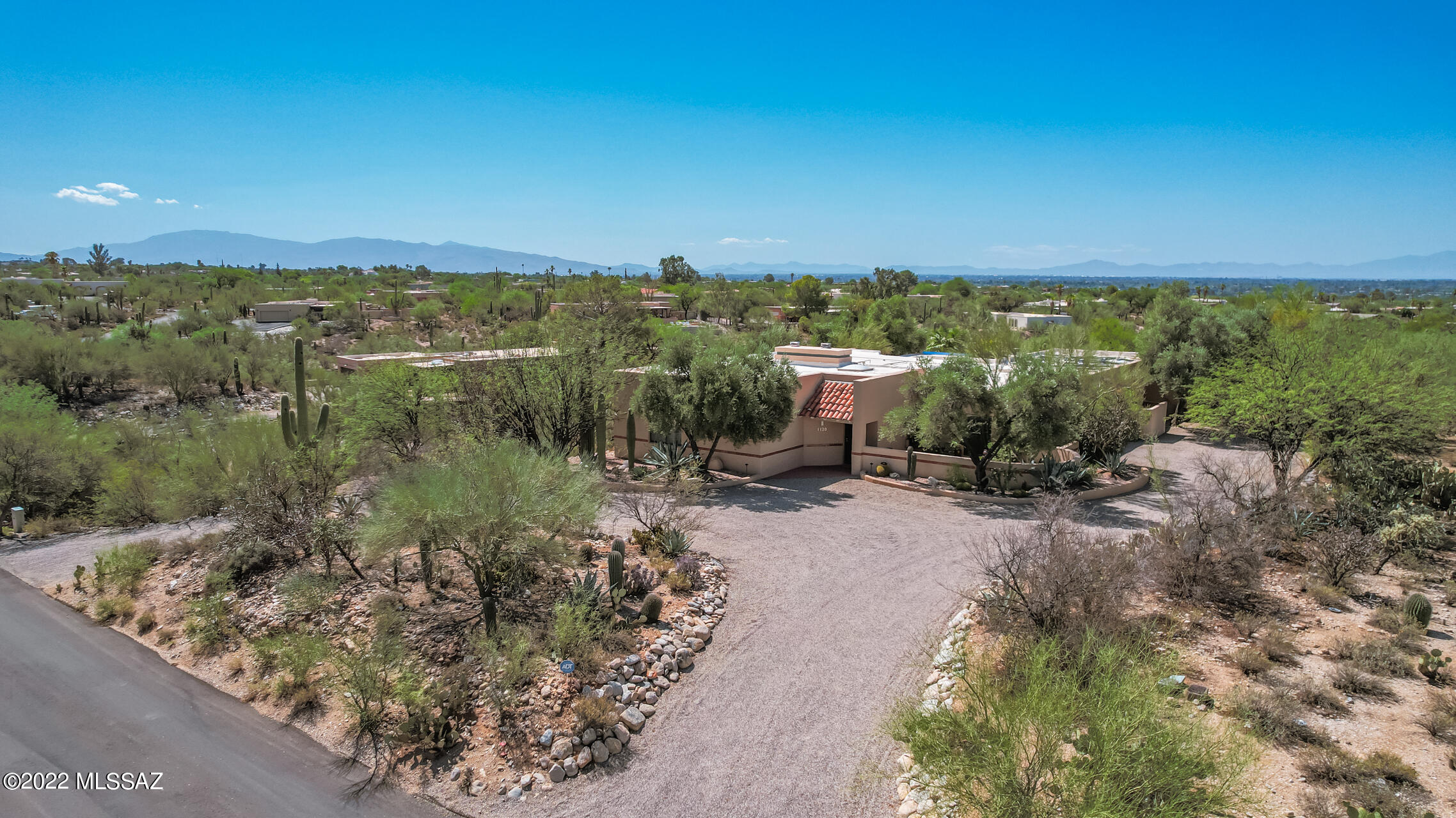 Fabulous La Quinta home on large private lot w/city & mountain views! Circular driveway, private courtyard, & side entry double garage! Immaculate interior boasting Mexican tile, skylights, & spacious living/dining room w/high beamed ceilings & sliding glass doors to side patio. Oversized laundry room has utility sink & lots of cabinets. Impeccable kitchen w/recessed lighting, ample white cabinets, SS appliances, quartz counters, & breakfast bar & pendant lighting. Grand main suite features walk-in closet & pristine ensuite w/skylight & dual sinks. Adjacent to wash, w/east-facing side patio & mountain views, & rear patio overlooking city lights. Sparkling pool, covered patio, seating area, pavers, & desert plants complete this oasis! Sparkling blue pool, covered patio, seating area, pavers, & desert plants complete the picture of this impressive Oasis! This gem won't disappoint. Act now before it's gone!
