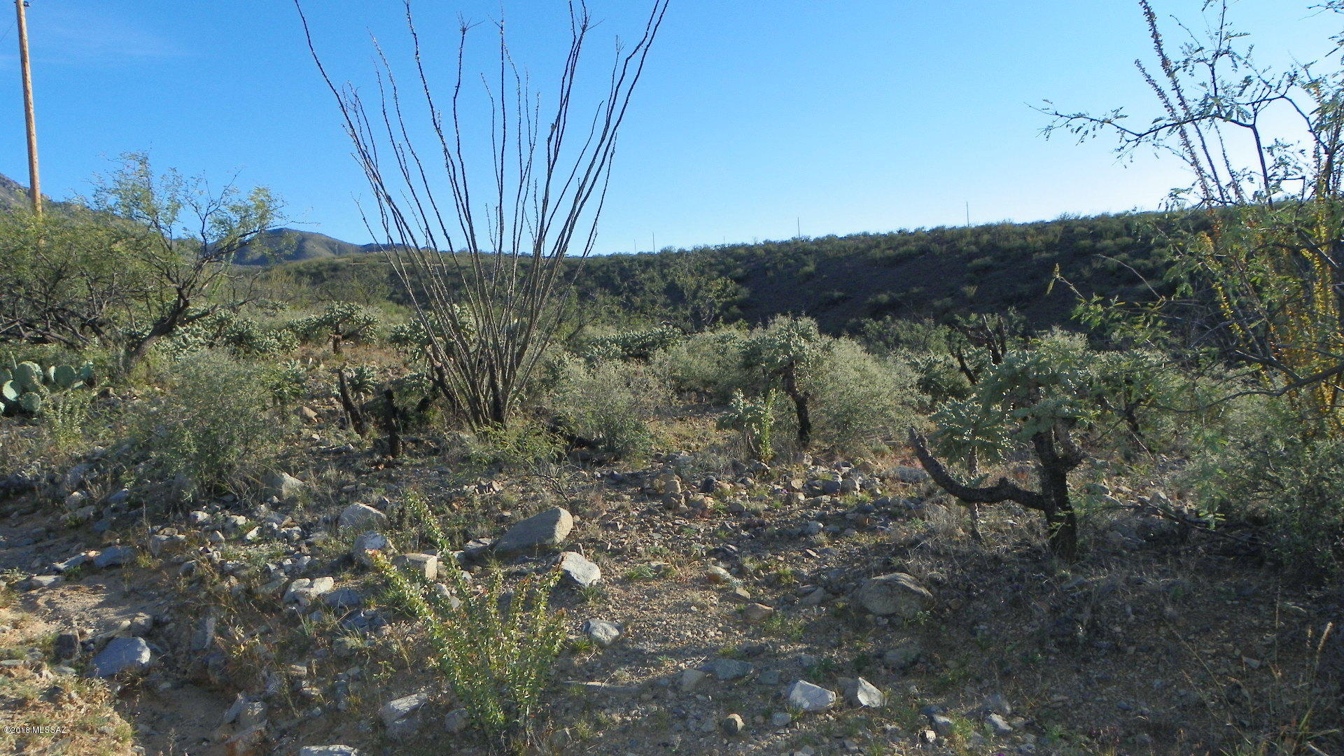 Nice residential lot with great views.  Road is dirt there is power lines at the street and water is probably at the street also but should be verified during inspection period.