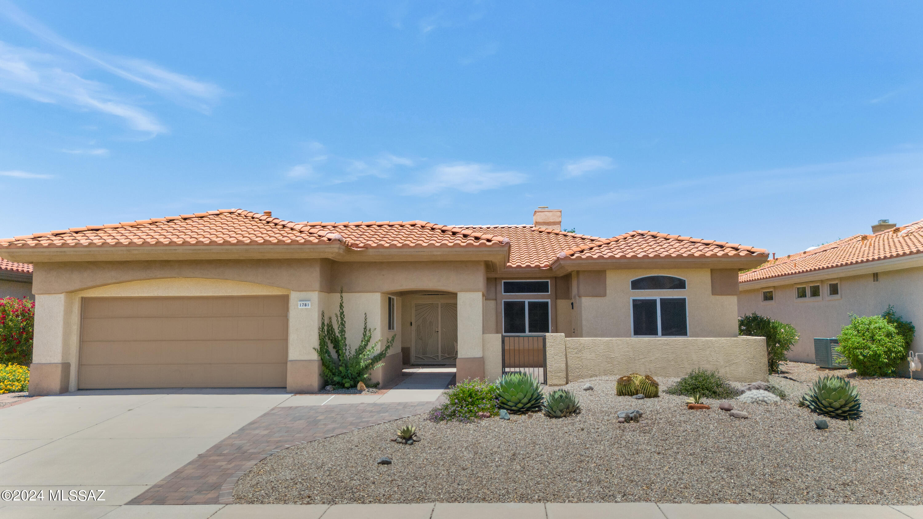 Welcome to this beautifully remodeled and turn-key 2BD/2BA home located in the award-winning community of Sun City in Rancho Vistoso. This stunning residence features uniform countertops and cabinets throughout, luxury vinyl plank flooring, and no carpet. Enjoy the brand new baseboards, soft close kitchen cabinets, quartz countertops, stainless steel appliances, and an oversized farm sink, all under new LED lighting. The entire interior has been freshly repainted, and the home boasts a new roof. The primary en-suite has been recently remodeled and includes a dual vanity with quartz countertops, luxury soft close cabinets, and a floor-to-ceiling tile shower. The laundry room offers brand new cabinets, quartz countertops, and a new laundry sink. Additional upgrades include a new waterline, all new toilets, and over $140,000 worth of improvements. Outside, you'll find a new irrigation system, low-maintenance desert gravel, and a new paver courtyard with breathtaking Catalina Mountain views. Sun City is a wonderful active-adult community with a community center, pickleball, community activities, and golf, all conveniently located near shopping, dining, and fun activities.