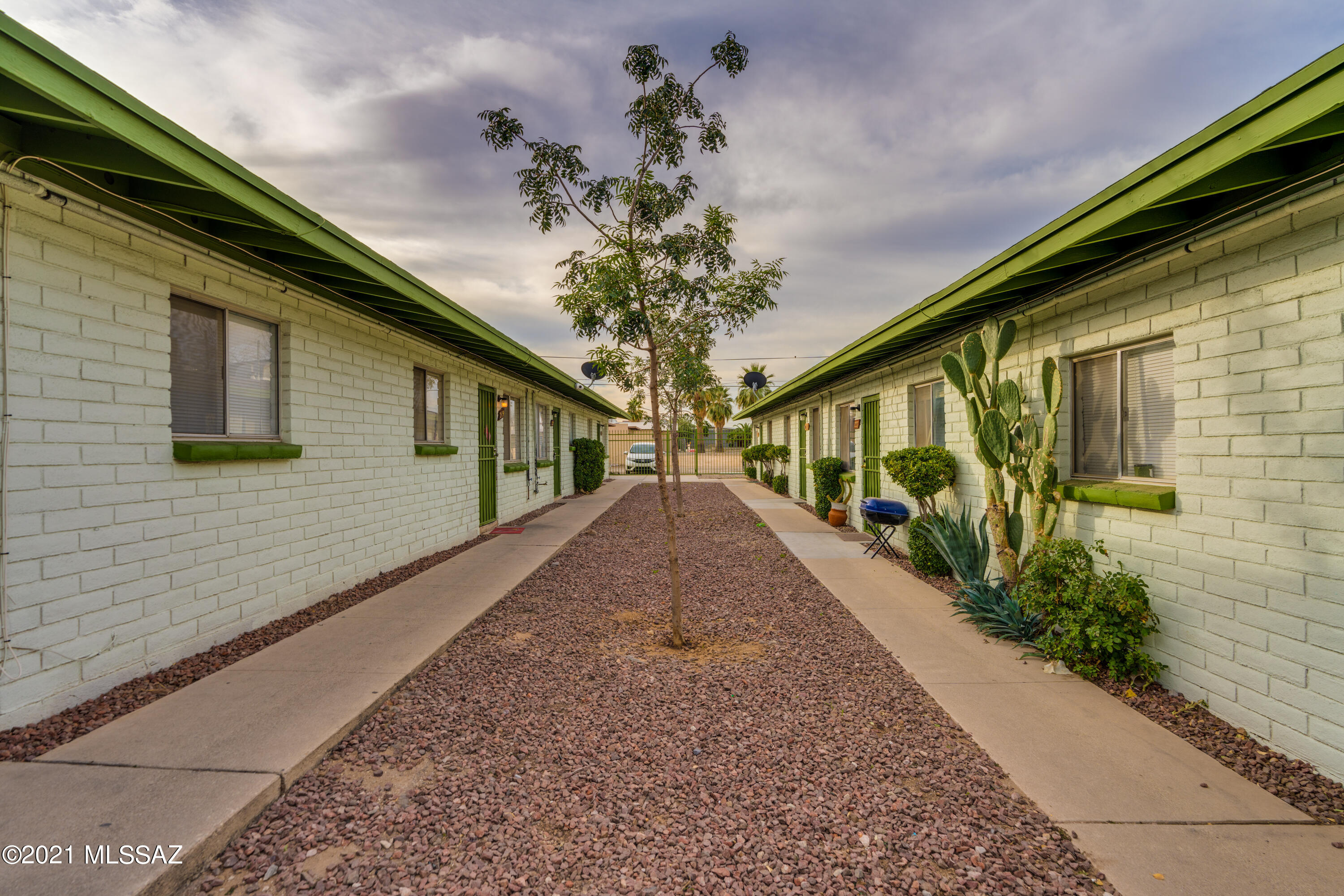 Fully leased turn key apartment! Eight 2 bedroom units in a renovated masonry garden style building with AC, security fencing, lights, and camera system. Laundry room on site. Washer and dryer will convey.
New roof in 2020. Two of the AC units have been replaced.  New landscaping in 2020 including replacing mesquite trees with three Red Push Pastiche trees. Owner pays garbage and water and electrical for common area lighting and laundry facility.