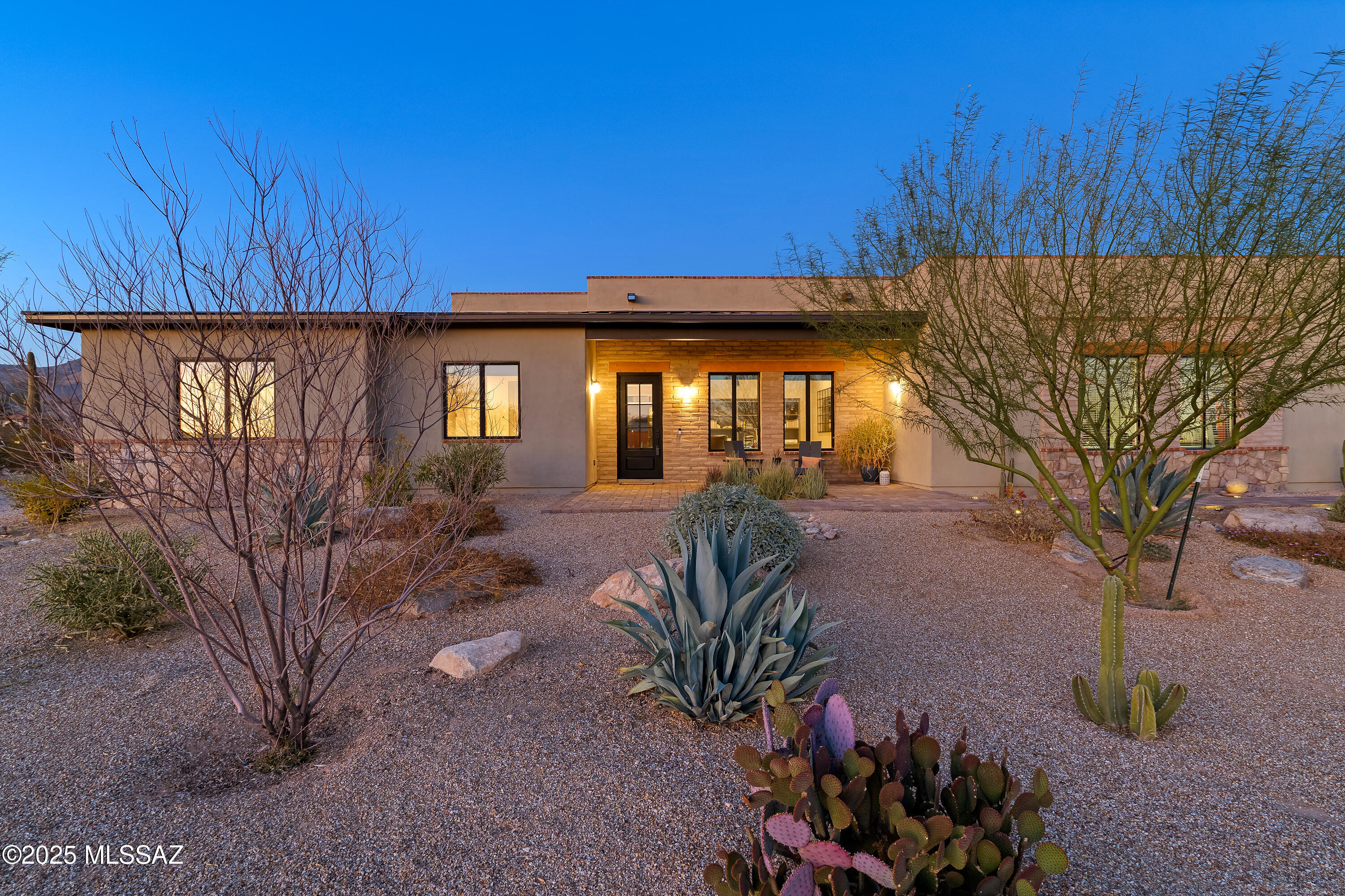Beautifully situated on just over an acre in the luxury gated Rancho Soldados community, this stunning property features 4 bedrooms, 3.5 bath, an office and bonus den. The backyard is a true oasis, boasting an expansive covered patio with breathtaking mountain views, a generous turf lawn, and a sparking pool with spa and Baja shelf ideal for entertaining and enjoying our Sonoran desert. 
Inside the home features an open-concept kitchen and living area with a spacious island, stylish bar seating and plenty of room for dining and gathering. The home offers a thoughtfully designed split floor plan, perfect for modern living. High ceilings adorned with wood beams add a touch of elegance and warmth. The home also features a three-car garage, providing ample storage and convenience. Custom tile work throughout and numerous upgraded finishes create a timeless environment. Whether you're enjoying the panoramic views or hosting gatherings, this home is sure to impress.