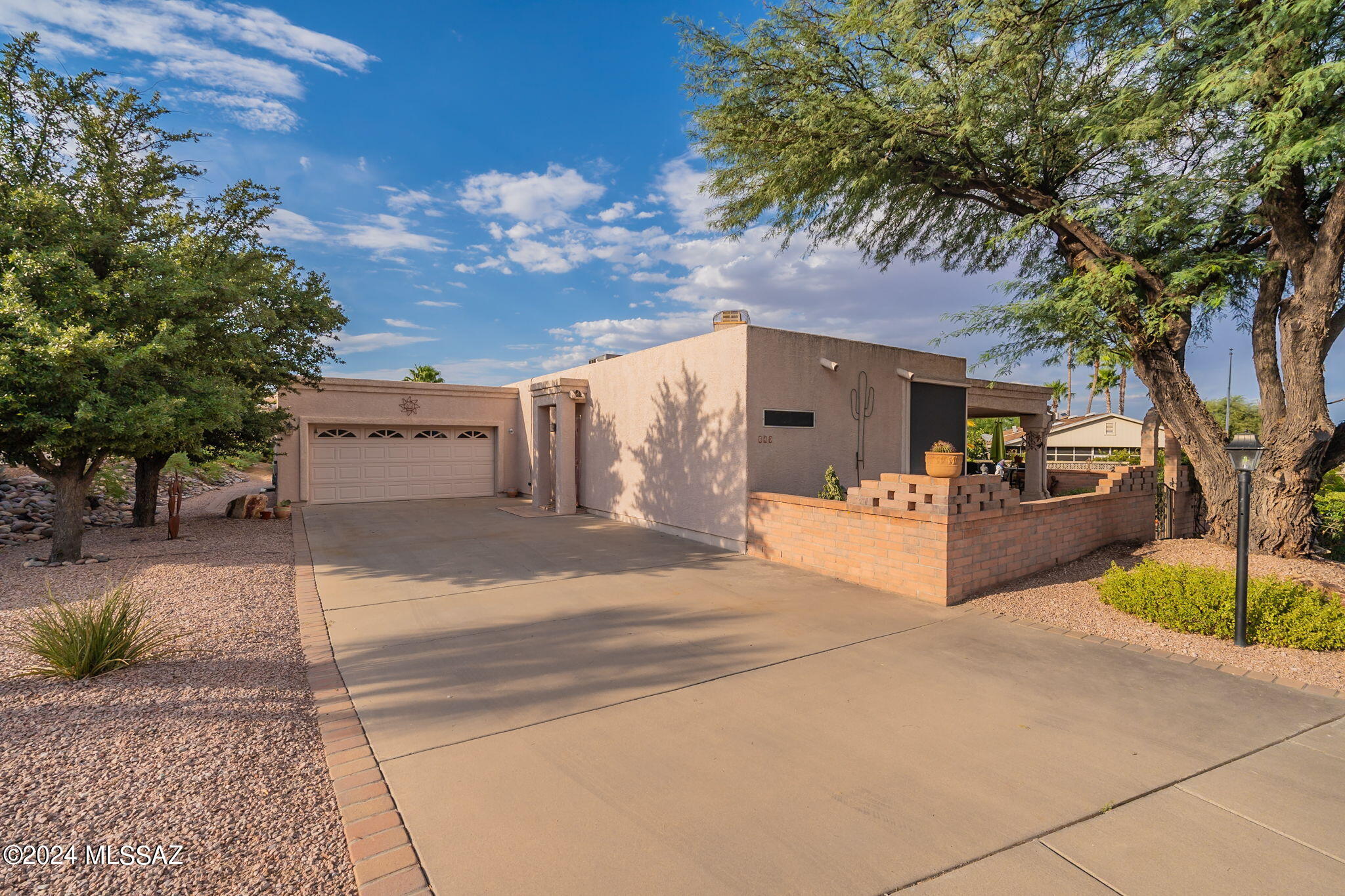 Price Adjusted! Welcome to 640 W Rio Moctezuma, a charming home in a serene 55+ community. Recent improvements include roof recoating with a 2-year warranty and new carpets! This home features ADA-accessible bathrooms and a wrap-around walkway for easy access. Inside, high ceilings create a spacious feel, and large windows bring in natural light. The beautifully landscaped yard is maintained with an irrigation system, and the plumbing is equipped with an instant hot water recirculating pump. The HOA provides access to a community center, pool, and more. Now offered at a newly adjusted price, with the option to include all furniture in a separate bill of sale! Old Republic Home Protection - gold package offered!