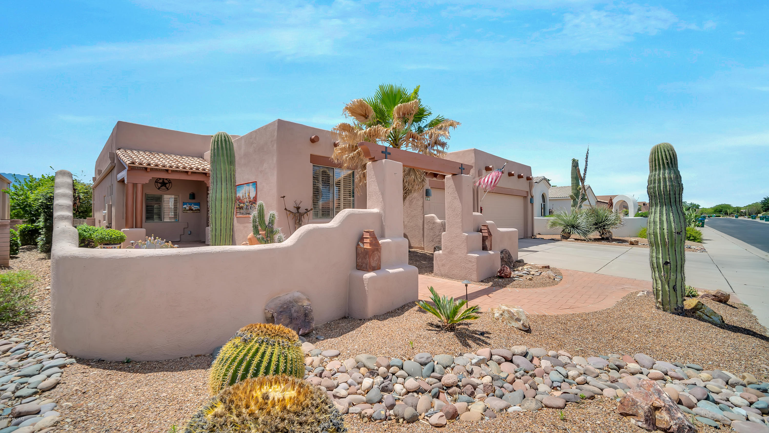 This spacious floor plan has fantastic views of the Santa Rita Mt. as well as the golf course. This 
home has a large great room with bee-hive fireplace.  The kitchen features a 5 burner range top newer cabinets, appliances are newer granite counter tops and a center island. Any cook would enjoy the wall of storage cabinets.
The master bdrm is a relaxing place to enjoy the view. The bath has 2 cabinets with sinks and a large tub and shower. The second bed room has a private bath for your guest to enjoy. This home has 2 car garage with a golf cart as the 3rd space. There are so many special things to this lovely Dorn built home you must take a look for yourself.