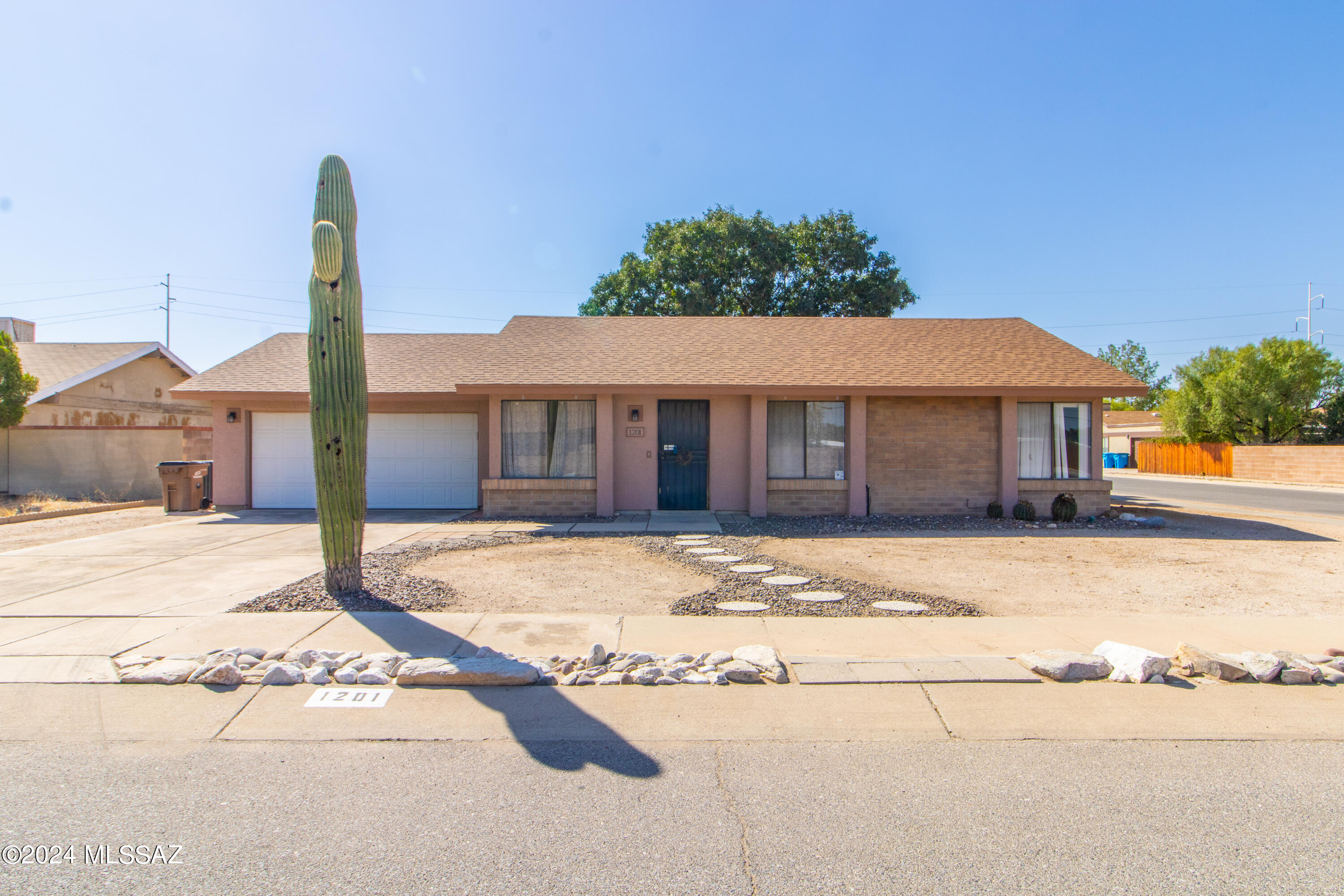 Charming home located in desirable Northwest Tucson community of Flair #2. This 2 BD/2 BA/1,270 Sq. Ft home offers inviting floorplan with a family room, dining area & breakfast nook. Property has NEW HVAC 6/24, water heater '21 & New roof '18. Cozy kitchen w/gas stove & all appliances convey.  Spacious primary suite has a separate sitting area or perfect space for a home office, large walk-in closet (safe stays) & shower. 2 car garage & laundry room off of garage. Huge backyard has plenty of space for your ideas, double gate for parking your toys, large shade tree, covered patio & large storage shed. Don't miss out on this perfect property!