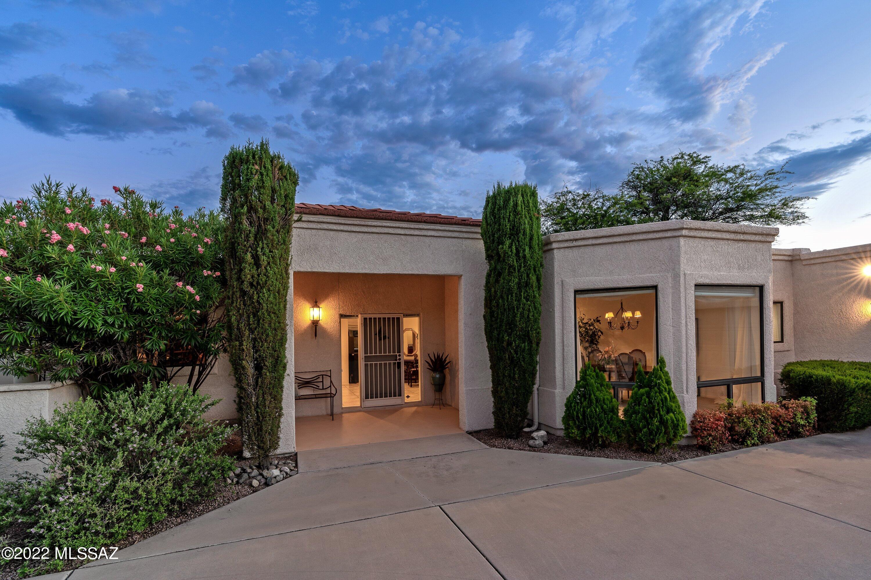 Enter the gate of Canada Hills Estates and take in the beauty of this luxury enclave nestled below Pusch Ridge.  Discover this home's serene and private setting at the end of an extended driveway on a quiet cul-de-sac and its timeless elegance with thoughtful design and impeccable attention to detail. Welcoming and spacious foyer is further accentuated with its high ceiling. Great room with large picture windows looks out to pool and patio, mountains, lush desert surroundings, and 9th fairway of El Conquistador Golf Course. Well appointed kitchen, with all appliances, features gas cooktop, center island, granite countertops, and side-by-side pantry and utility closets. Informal dining and wet bar join kitchen to great room. Formal dining room with tall bay windows is the perfect setting for exquisite dinner parties. By virtue of good design, this room could also serve as a formal living room, a library or playroom, or impressive home office. Expansive owners' suite, with private sitting area/retreat has a private entrance to the pool and spa, a large walk-in, and an equally expansive bath with custom garden tub, separate shower, dual vanities, and dual linen closets. Additional bath adjacent to owners' suite could serve as second bath to suite, or as bath for second bedroom. Third bedroom, with entrance to patio, shares hall bath, making this a home with all en-suite bedrooms. Completing the interior are both a large laundry room and an interior heated and cooled workshop. Laundry has utility sink, natural light, and room for a sewing/craft area. Workshop is perfect as it is, or could be a studio, workout room, private office, or climate-controlled storage. As perfect complement to the interior, a wrap-around patio surrounds the great room, kitchen, informal dining, owners' suite, and extends to the third bedroom, providing seamless indoor-outdoor living. Entertain large groups with ease or enjoy quiet dinners, al fresco, overlooking the golf course. Bask in the pool and spa, with Pusch Ridge, above. The new owner of this home won't wish to leave, however, a wide array of shopping and dining are minutes away. Grocery and pharmacy are a three minute drive. Varied business and medical, also close by. Golf at El Conquistador (featuring two championship courses and a 9-hole course) as well as lap swimming, fitness, racquetball, pickle ball, and more (available at Oro Valley Community and Recreation Center) are within a mile of this home. Oro Valley is a thriving community, and this is a wonderful opportunity to own a lovely home, never before listed, in one of its best neighborhoods!
