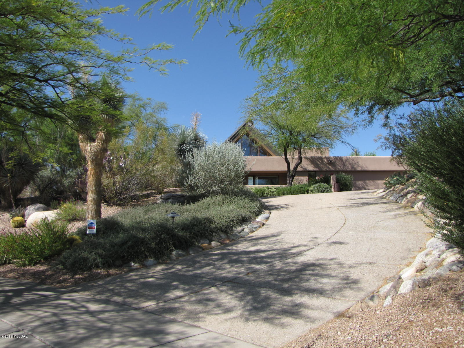 Built 1997 Exceptional 3 bedroom, 4 bathroom plus den in a gated subdivision. Mountain views. Wood beam ceilings. Gas fireplaces in living room and family room.  Master suite with jetted tub, large tiled shower. Walk-in closet. All bedrooms have en-suite baths and walk in closets. Den has a door and window for privacy.  Landscaped yard with built in BBQ, synthetic lawn. Cul-de-sac lot. Central vacuum. Utility sink in laundry room and garage. Security Deposit $3745.00.  Pets subject to approval.***Rental Rates Reflect A $65 Concession For Tenant's Agreement To Change HVAC Filters Monthly. Rental Rates Are $65/MO Higher Than Stated W/O Concession.***