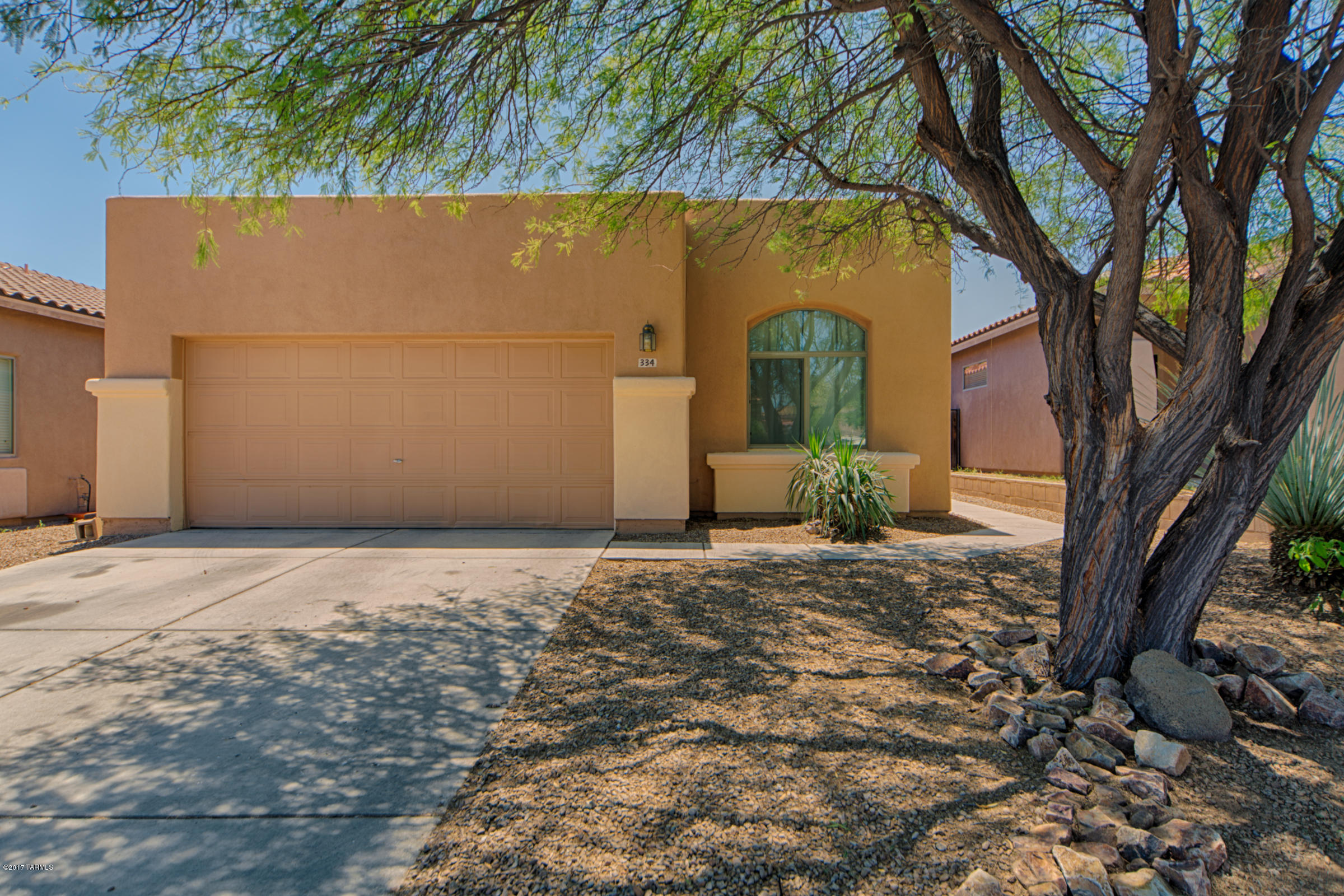 Sparkling! Three bedrooms & two full baths. Interior has been completely painted in neutral colors. New carpet in Great Room and all bedrooms. Exterior has been painted.New carpet in all bedrooms and great room. Kitchen features plenty of cabinets and breakfast bar. Large master bedroom w/walk-in closet and private bath. Nice backyard with covered patio, shade trees and room to play. Near parks & community pool.