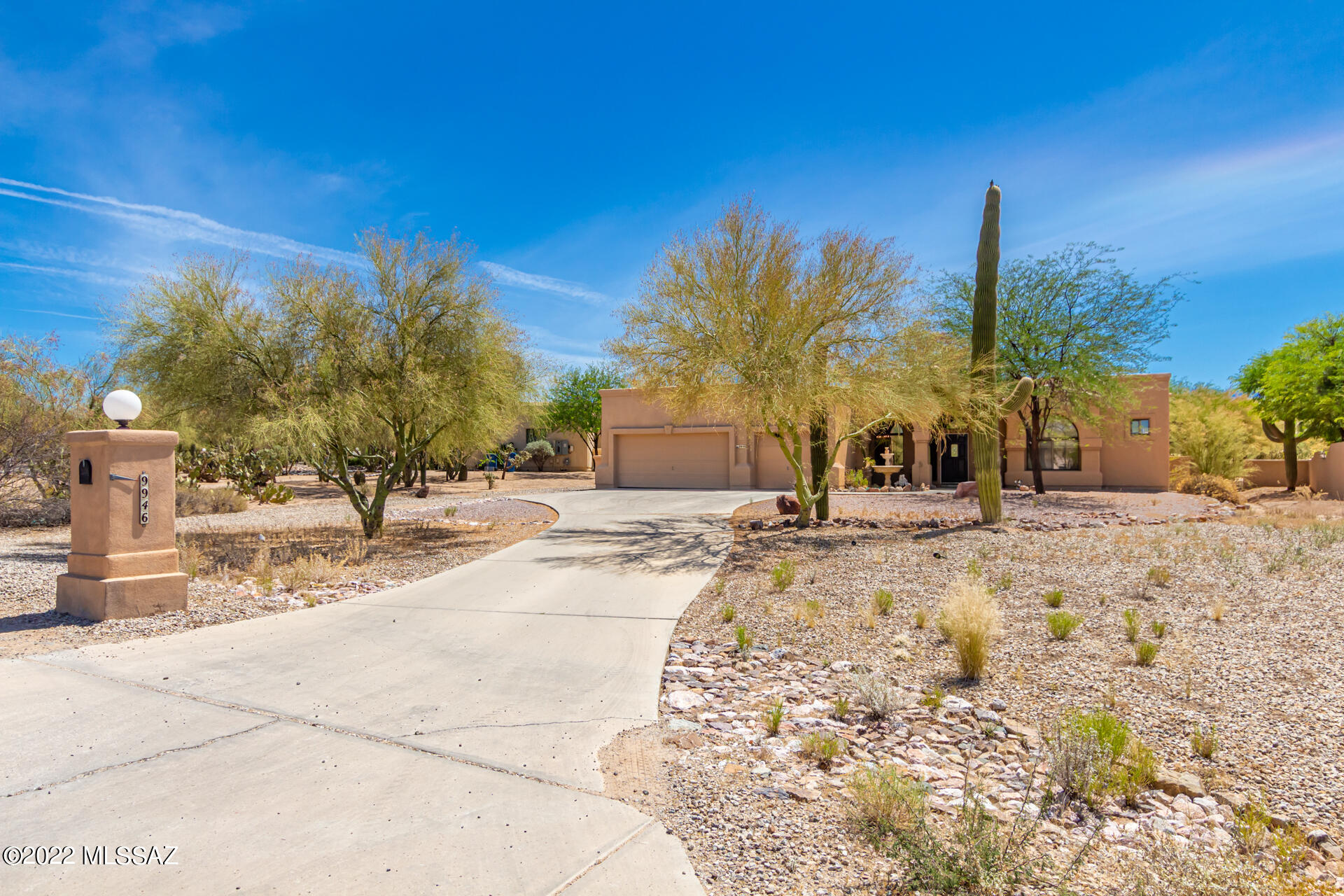 Stunning 5bd 3ba semi-custom home with 3-car garage nestled in a quiet cul-de-sac in NW Tucson. Discover an impressive interior with archways throughout w/stone accents, updated wood-look & tile flooring, neutral palette, & huge windows that bring in lots of natural light. Formal dining room has an enchanting chandelier! Newly updated Chefs eat-in kitchen  showcases ample cabinetry w/crown molding, gleaming granite counters, high-end SS appliances, stylish tile backsplash, large custom island w/breakfast bar, and breakfast nook. Grand suite includes patio access, lavish ensuite w/dual sinks, updated shower, a garden tub with magnificent views. Resort-like backyard is an entertainer's dream, with its updated shimmering pool/spa and breathtaking mountain views. Make this gem yours now.