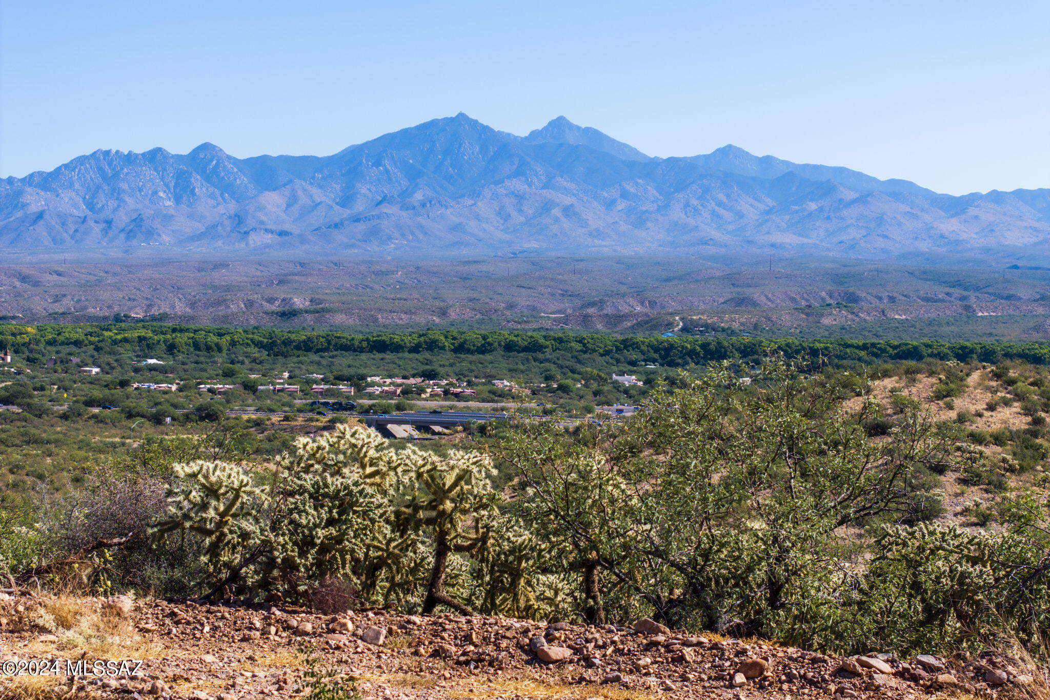 Stunning 24 acre parcel in Tubac, AZ with multiple building sites for 1 or several homes. OWNER CARRY AVAILABLE & YOU MAY PURCHASE SOME OF THE PROPERTY OR ALL OF IT! Property division is possible into 5 parcels each with views of both the Tumacacori & Santa Rita mountains OR you can elect one building site on 24 acres allowing for plenty of elbow room & no HOA. This land is situated only minutes to the frontage road to I-19, yet provides an opportunity to be a world away from busy city life. Less than a mile to the historic village of Tubac with over 100 shops, artists galleries & restaurants. In addition, another few minutes from the village is the renowned 4 Diamond Tubac Golf Resort with a 27 hole golf course as well as a spa & restaurant all combined in a beautiful resort setting.