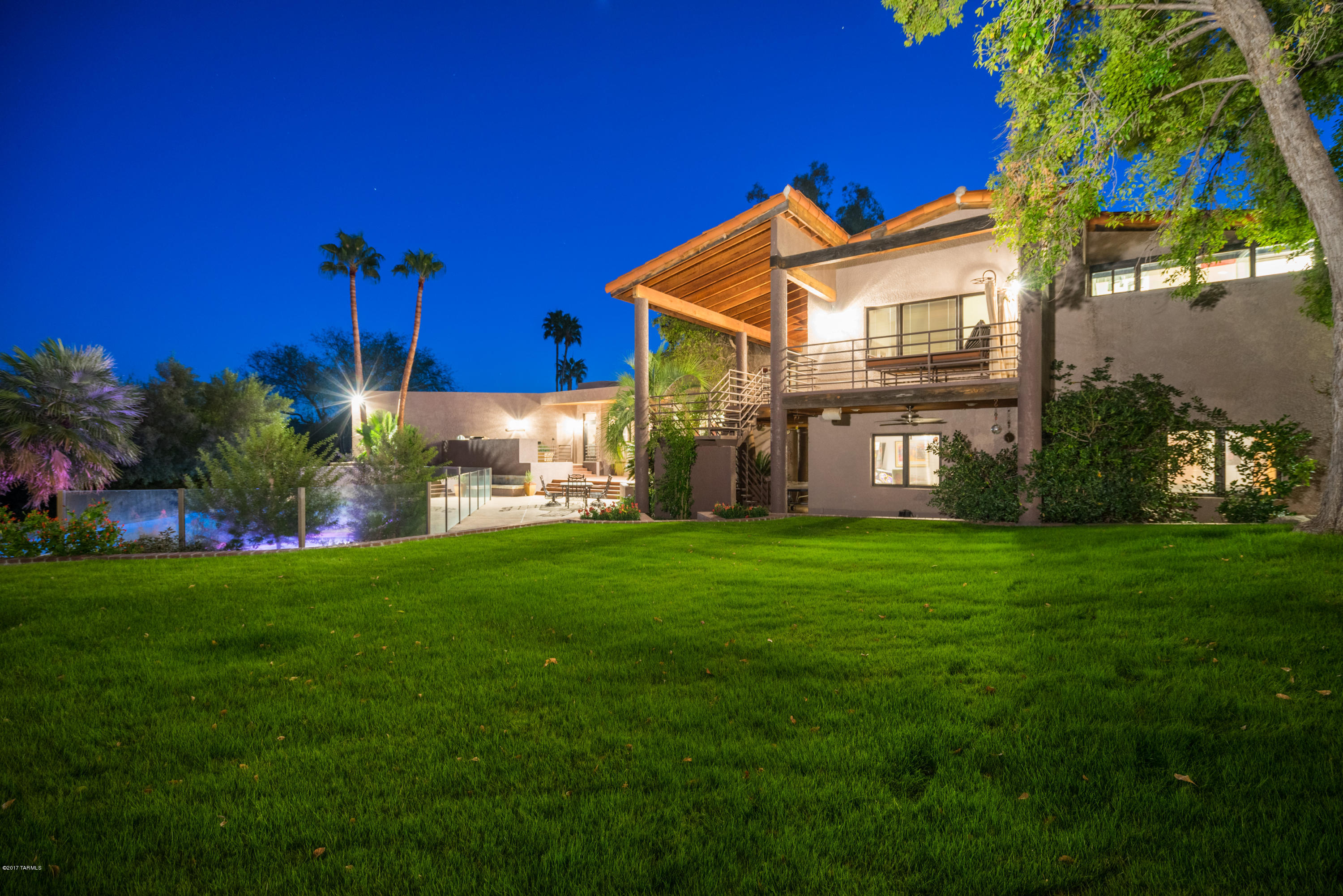 Updated,Tri-Level,Contemporary Home On A Private Lot Backing Up To Almost 50 Acres of Open Desert.The Sellers Purchased This Sprawling Property Almost Ten Years Ago As Their “Forever Home” And Have Made Significant Improvements.An Oversized Great Rm w/Vaulted Ceilings & Large Picture Windows Is the Centerpiece of this Architecturally Unique Home.The Top Level Master Bedroom Includes a Fireplace,Spa Like Bath,Balcony,Loft/Office & Workout Rm.The Lower Level Features a Rec/Media Rm,& 3BR’s/2BA’s.Main level includes a Stunning Kitchen,Dinning Rm,Guest Suite,Maids Quarters, & Laundry Rm.Resort-Like Backyard Features A Pool w/ Swim Up Bar,Outdoor Kitchen,Large Grassy Area,Gazebo,& a Shared BB Court. Newer HVAC's,HALO Water Softener, & Resurfaced Pool. **3D Floor Plan & Video under photo