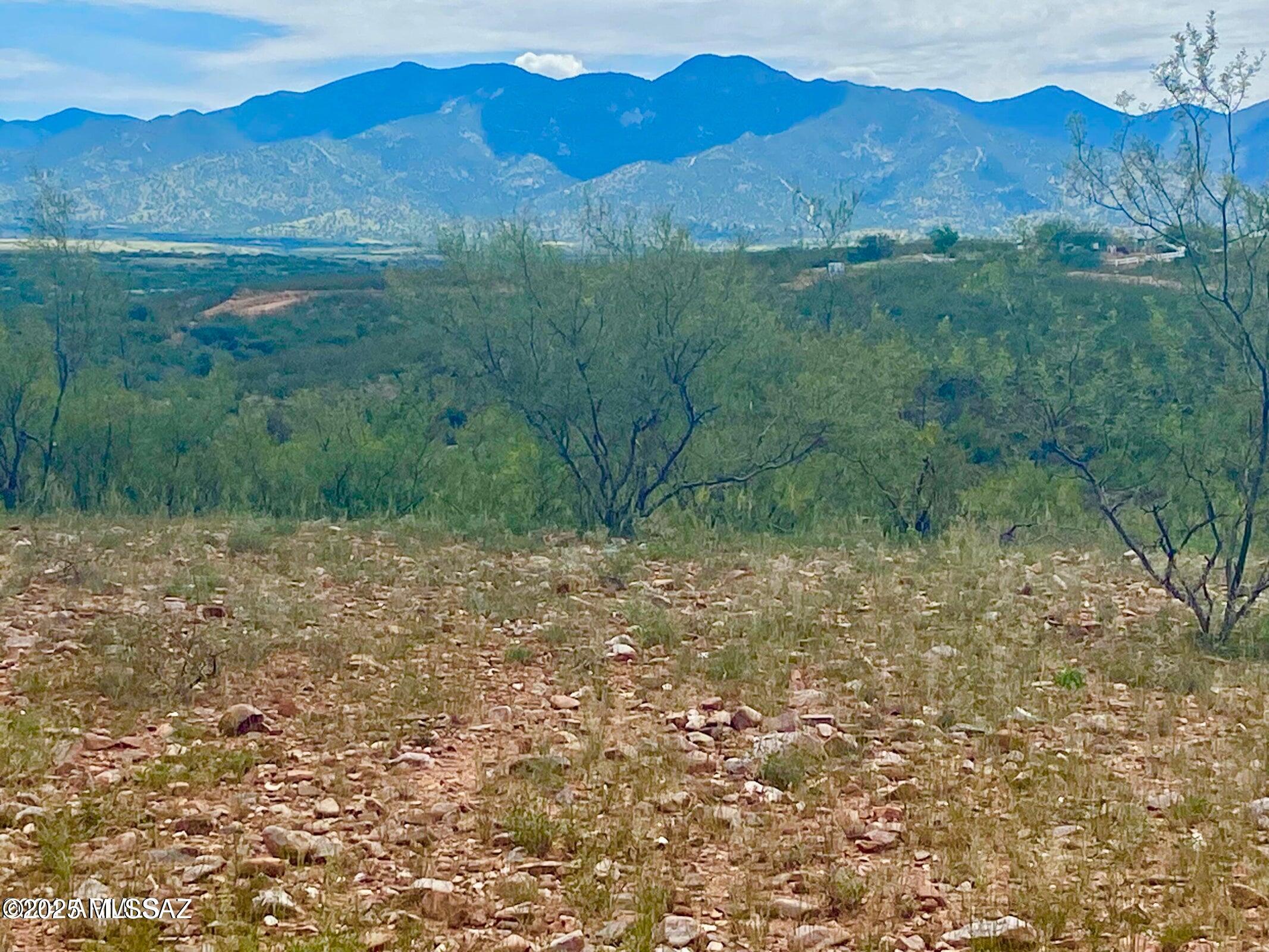 **OWNER CARRY** $3,393 Down Payment and $447.31 monthly payment.  From this 8 plus acres, you have stunning 360-degree views from the center of the lot. Build your dream home or ranch.... the choice is yours. Electric is within 300 feet and water would be hauled, delivered, or you can drill a well. Recently surveyed. Survey in documents.