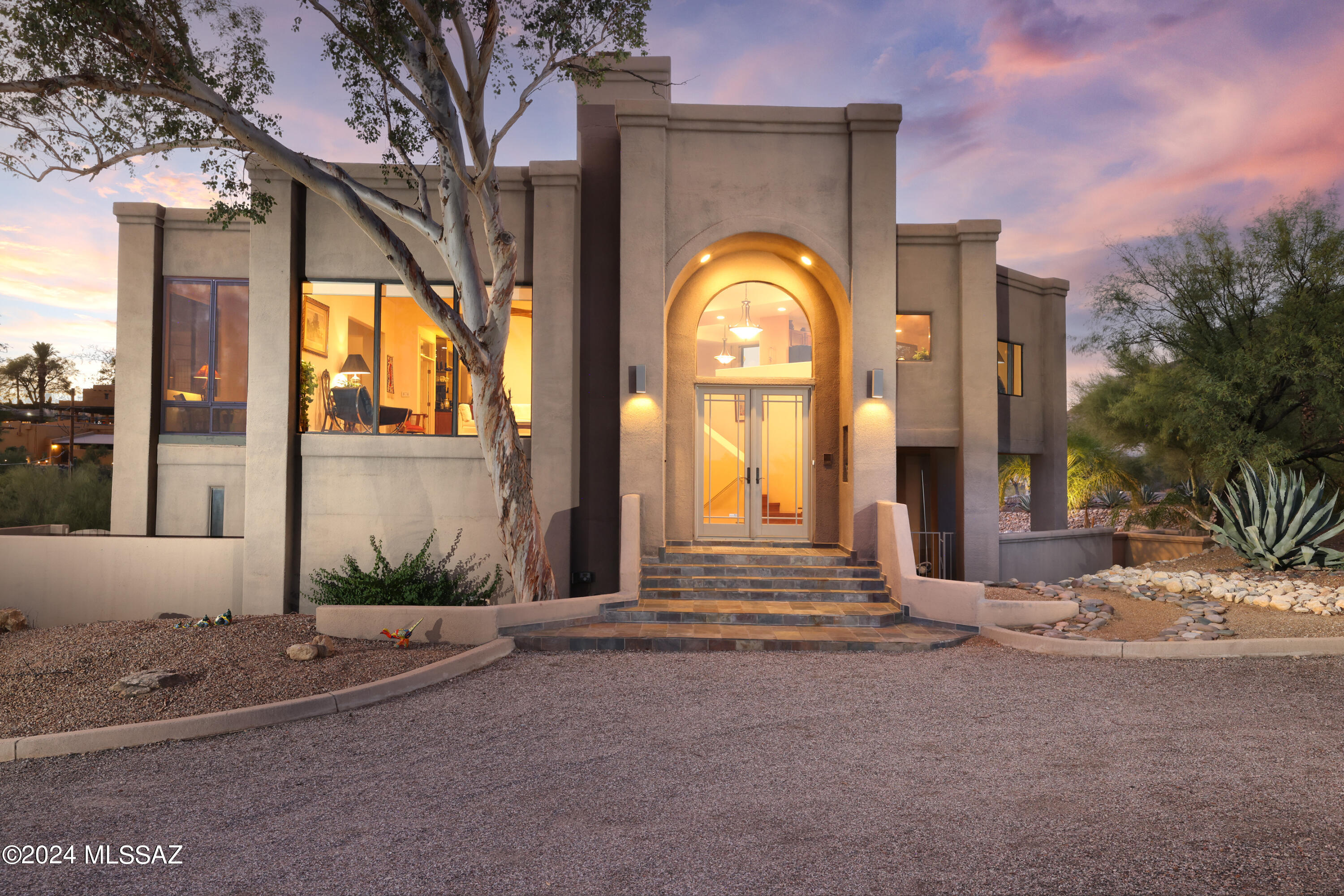 Contemporary Foothills home on over an acre in a Cul-de-Sac. This exceptional residence is strategically positioned to maximize breathtaking views from every room! Featuring a stunning pool and spa amidst a spacious yard, ideal for entertaining with access from both the kitchen patio and master suite via a spiral staircase. Boasting over 3,000 square feet of meticulously maintained living space! This home includes 3 bedrooms plus a den, 2.5 baths, and amenities such as two gas fireplaces (one in the great room and one in the master bedroom). The pristine kitchen offers beautiful hardwood flooring, modern lighting, with complimentary granite countertops. The expansive windows provide an abundance of natural light and stunning vistas of the mountains and cityscape. A must see! see!