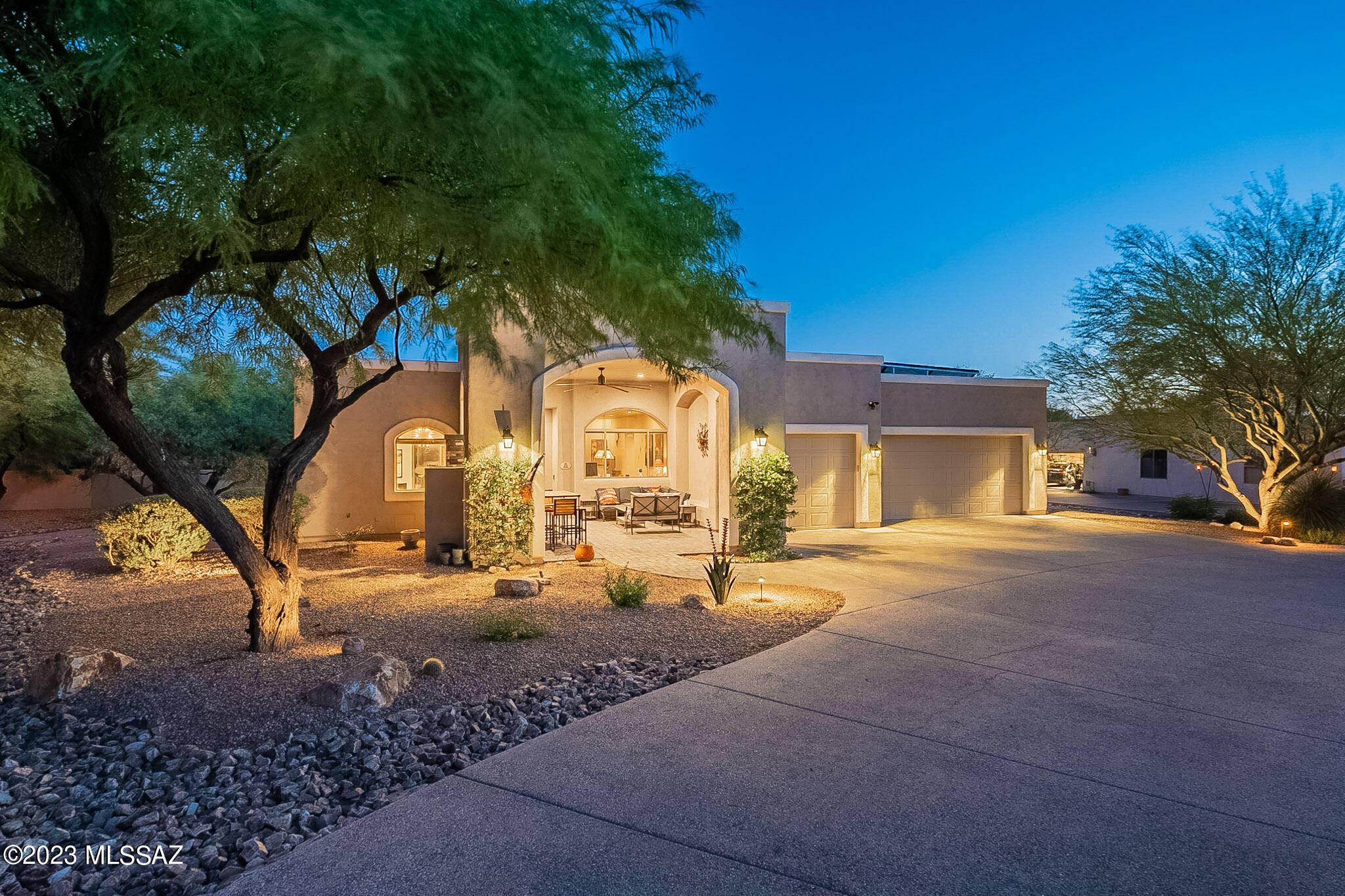 Seller will accept or counter offers between 849,000 to 899,000.  BEAUTIFUL one of a kind CUSTOM Home in Highly sought after 49er's!  Front Entry patio with Gas Fireplace TV, setting area  Porcelain wood like tile flooring throughout, 10 foot ceilings, split bedroom plan, Huge custom kitchen with Granite Slab counter tops, Farmers sink, 5 burner gas cooktop, pantry, built in desk area, upgraded lighting,  OWNED SOLAR for super low electric.  Covered Outside Kitchen with CONCRETE countertops, fridge, sink, ice chest and BBQ!  HEATED pool for Entertaining, Spacious Covered Patio, Artificial Turf and low care front and back. Large Primary suite with walk in closet, electric fireplace, jetted tub, walk in shower.  Central vacuum, Water softener, Water Filtration ...