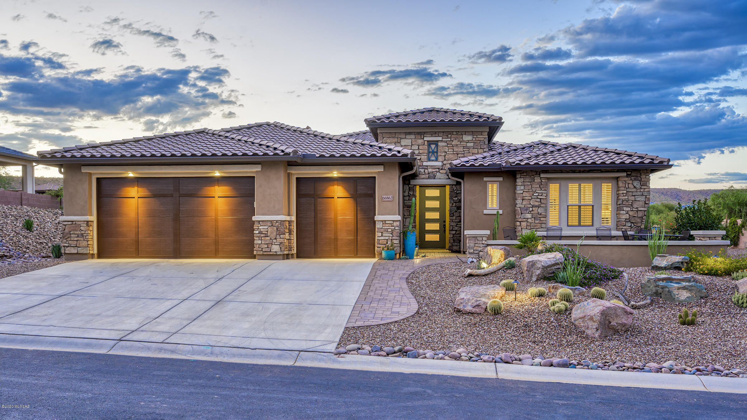 Saddlebrooke Preserve,  2018 Paloma model sited on prime lot w golf course & mountain views front and back. Entertainers delight from the highly upgraded open floorplan to the outdoor living room, built-in BBQ/smoker, + firepit, this is your ideal SaddleBrooke home. Great room w custom entertainment wall & built-in wet bar along w large slider providing access to outdoor living room. Gourmet kitchen has stainless appliances w gas cooktop, granite counters, butler's pantry + walk-in pantry. Spacious dining room w golf course views. Master retreat has en-suite w walk-in shower, double vanity + walk-in closets. Den, private guest suite, powder room, 3 car garage w storage. Back patio & yard w plenty of hardscape takes full advantage of golf course views & completes this special hom