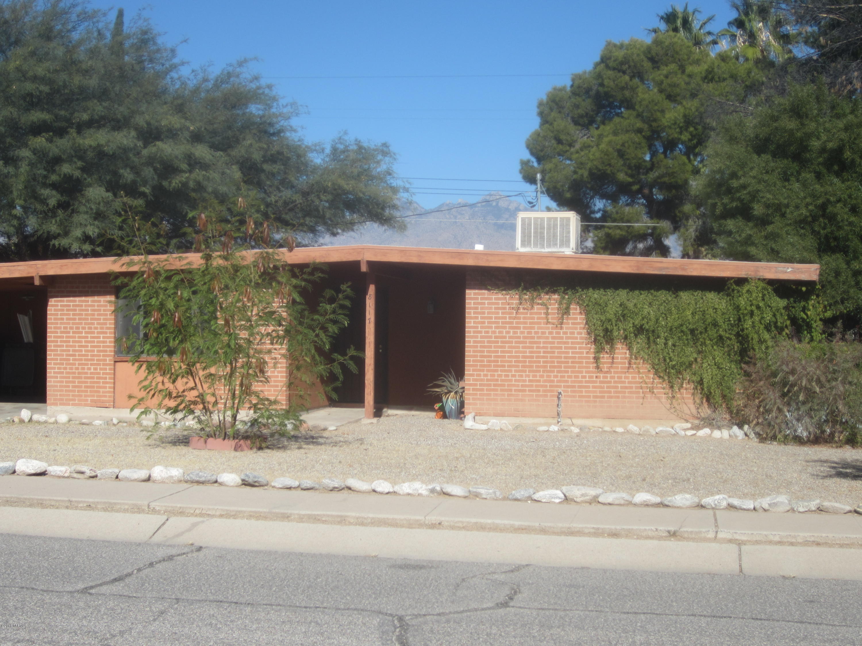 Cozy 3bd, 2ba red brick home. Centrally located within a well established neighborhood. Fresh paint throughout. Upgraded bathroom sinks with pedestals, and light fixtures. Ceramic flooring throughout. Security alarm installed, although Buyer service contract required. Rear patio cover with great views, and a large back yard with some mature trees and bushes, but ready for your personal touch. Located in a cul-de-sac with easy in and out access. Property close to schools, shopping, food and other amenities. Don't wait long. Bring all offers to make this home a comfortable reality.