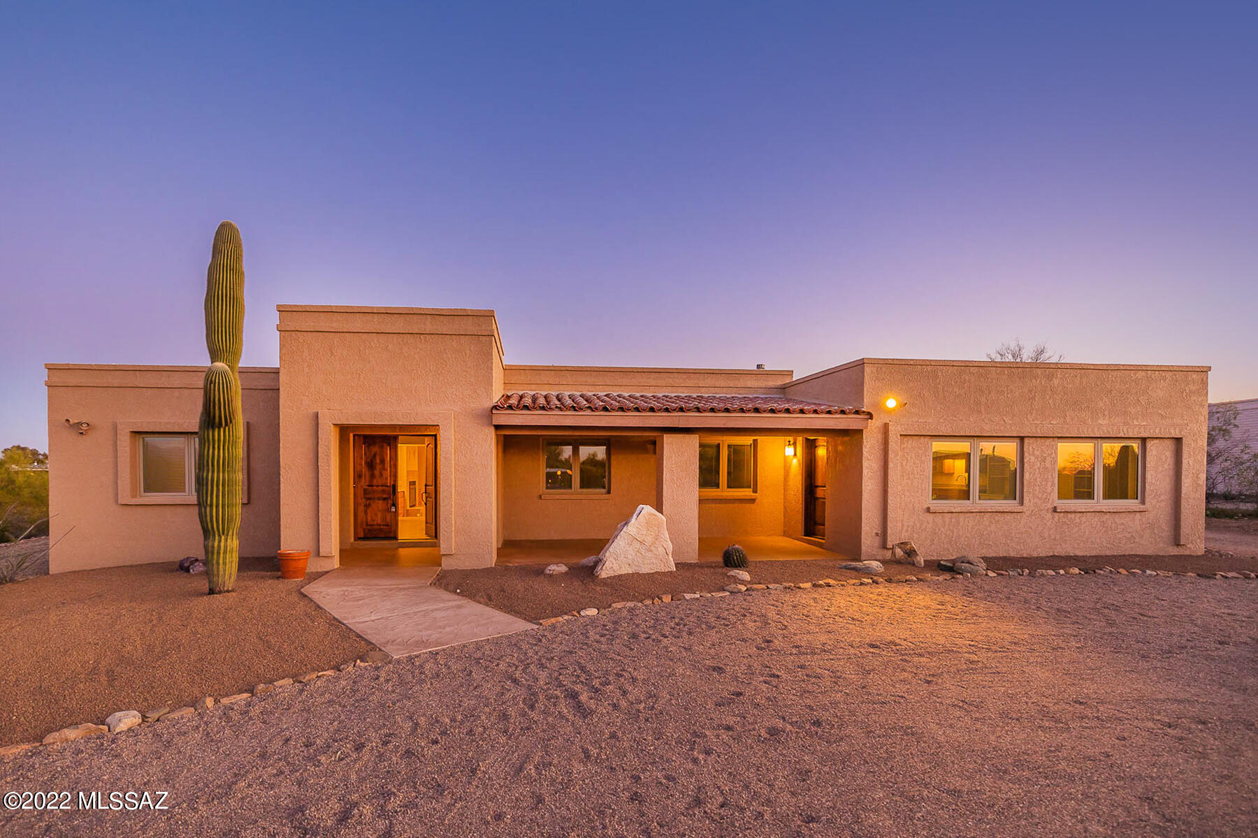 Bring the horses! Incredible Southwest Style remodeled custom home on an acre lot offering privacy and views. Remodeled kitchen with SS Dacor appliances, beautiful custom cabinetry and granite counters. Luxurious remodeled master bath with granite counters, dual vanities, jetted tub and large walk-in closet. Family room w/cozy fireplace. Living and Dining rooms. AMAZING custom built-ins throughout. Spacious guest suite (or 4th BR) with kitchenette and hide-a-bed. Pella windows and doors. Updated TRANE HVAC units. Freshly painted interior. AZ room and 2 covered  patios. Walled rear yard w/views. Horse arena & stalls. See 3D scan. See attached documents for improvements already made and copy of floor plan. See agent only remarks for estate sale offer requirements. Arizona Room and 2 covered patios. 
Trustee signs all documents. Write in offer No SPDS or CLUE REPORT. Sold as-is. Sample of as-is counter offer is in attached documents. Call LA for details. Please use Pioneer Title Agency. Desha K. Jackson 1660 East River Road Suite 150 Tucson, Arizona 85718 Office: 520.529.0700 Ext. 824 teamjackson@ptaaz.com. Septic has been pumped and certified. Trane HVAC units have been certified by 2-10 Home Buyer's Warranty. CCRs state only 2 horses allowed per acre lot.