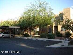Newer 2 story 3BR/2BA townhome end unit. No one above or below. Updated with new ceramic tile flooring main level. Main level has spacious living room w/electric fireplace, kitchen, dining area, bedroom, bathroom and laundry closet. Upstairs has the 2 additional bedrooms and bathroom. High ceilings. Private rear yard has privacy wall, covered patio and storage room. Each townhome has 2 designated covered parking spots. Immaculate and freshly painted! GREAT LOCATION! Note new ceramic tile may be different from what is shown in photos.