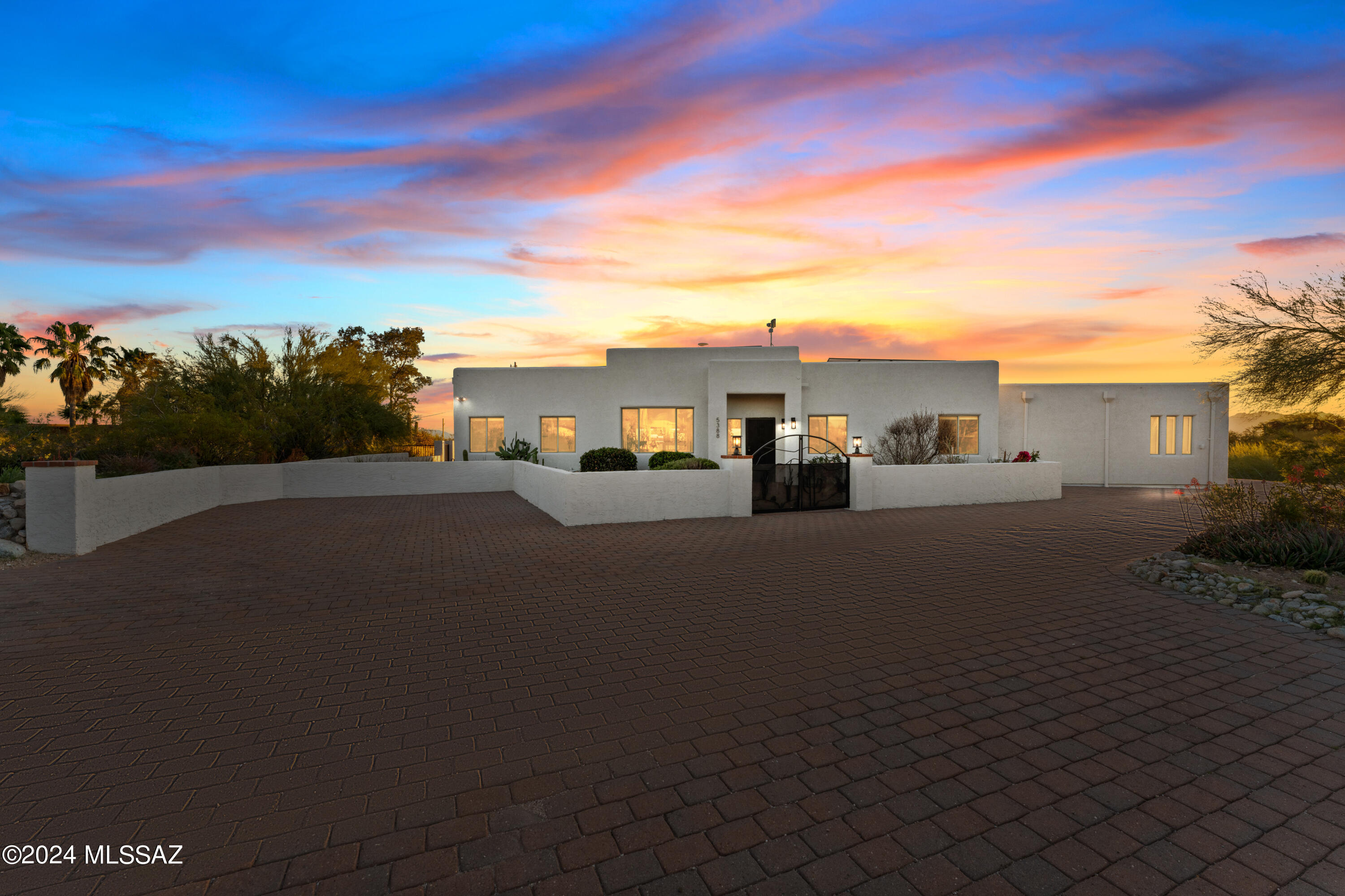 Nestled in Oracle Foothill Estates, this 3-bed, 2.5 bath home on a vast 1.19 acre corner lot offers panoramic mountain and city light views. built in 2000 and undergoing transformation, featuring fresh paint, lighting, remodeled bathrooms, new flooring and baseboards. Enjoy Arizona's sunshine in the newly installed pool while benefiting from the 2022 solar system for energy efficiency. The spacious property boasts desert landscaping, fruit trees and a private oasis for outdoor living. Access from lower driveway also provides unlimited building opportunities for an additional garage or even Casita without obstructing views.  
Owner/Agent.