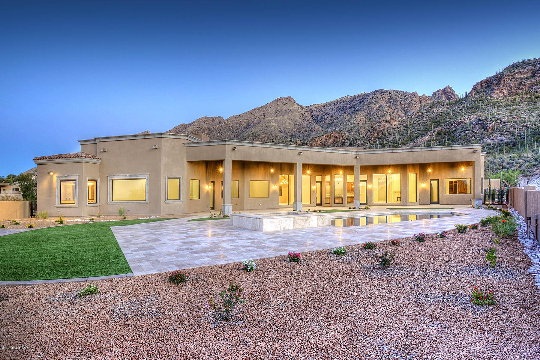 Brand new, spectacular Mediterranean contemporary in prestigious, gated Finisterra.  Stunning does not begin to describe this 6 bedroom, 5 ½ bath, 6083 sqft home at the top of a ridge at the end of a cul-de-sac w/sweeping Ventana Canyon, Catalina and Rincon Mtn. and city views on a 1.55 acre lot.  Paver driveway leads to custom wrought iron entry door into living room/dining room w/soaring ceilings, walls of windows, custom wrought iron light fixtures, travertine floors and alder wood doors throughout.  Family room and chef's kitchen offers granite counters, SS designer appliances, oversized center island and custom cabinetry.  Gracious master suite features spa tub, dual vanities, dual walk-in closets with custom built-ins.  Fireplaces in living room, family room and master.