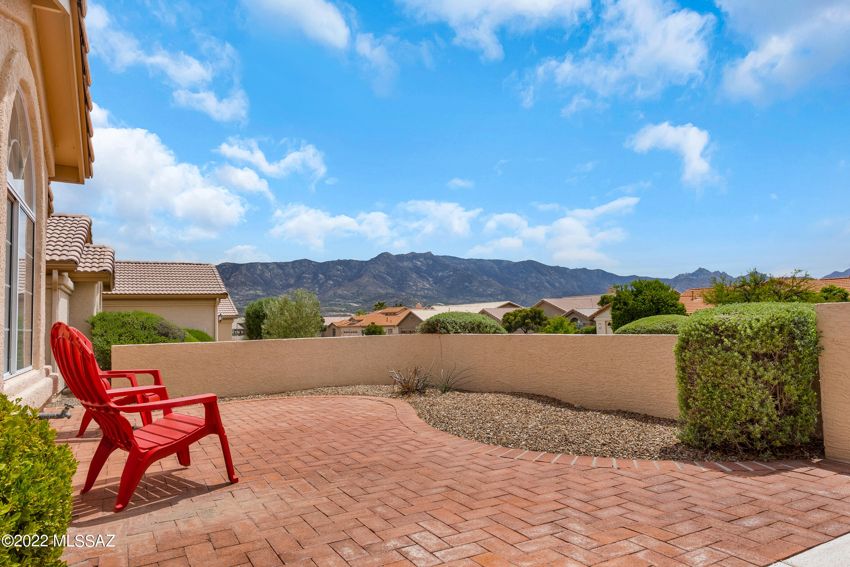 This is it! Two bedroom plus den popular TOPAZ floor plan located in Saddlebrooke, Tucson's Premier Active Adult Retirement community. This is located on a quiet street and has a park-like backyard. Features saltillo tile, Berber carpet, Corian countertops and sink in kitchen & bathrooms, gas fireplace in family room off kitchen, HVAC new in 2019, updated water heater, EXTENDED garage with garage storage cabinets & manual door, epoxy-coated garage floor and driveway, sink in garage, plantation shutters, expanded master bedroom, ceiling fans, solartube in kitchen, enhance storage in laundry room, newer washer/dryer, gas hookup for BBQ, and the list goes on.