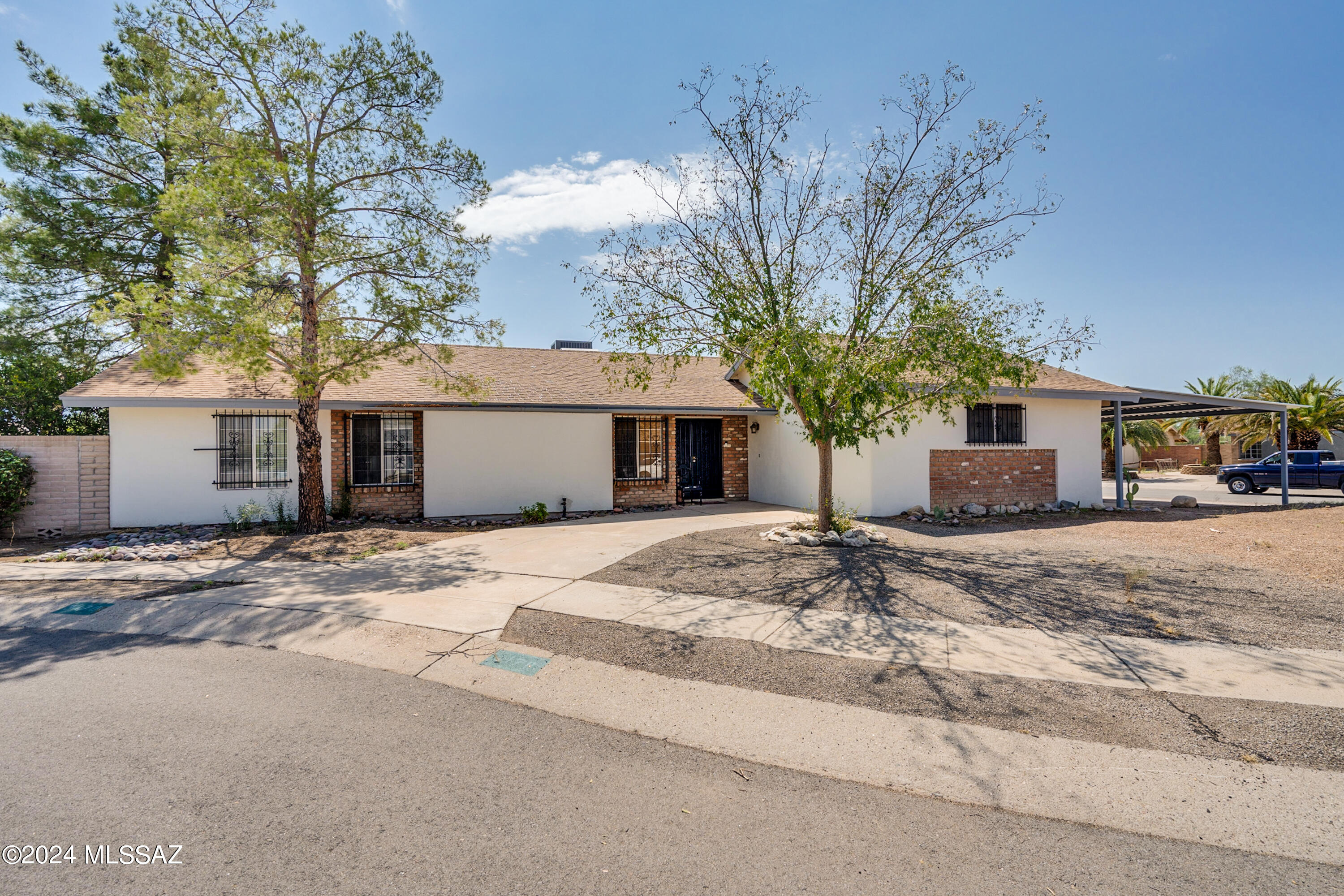 **New Shingle Roof to be professionally installed prior to close of escrow** Welcome to this 4-bedroom, 2-bath home, just under 2,000 sq ft,  on a .22-acre lot in a cul-de-sac. This gem features a pool and RV parking, with no HOA. The backyard is ready for your personal touch, complete with mature fruit trees.
Inside enjoy pitched high ceilings, a large family room, dining room, breakfast bar, and a living room with a cozy fireplace. The bedrooms come with ample closet space. Additional highlights include a top-of-the-line Speed Queen washer and dryer, a 1-year-old dishwasher, and a 2-year-old hot water heater.