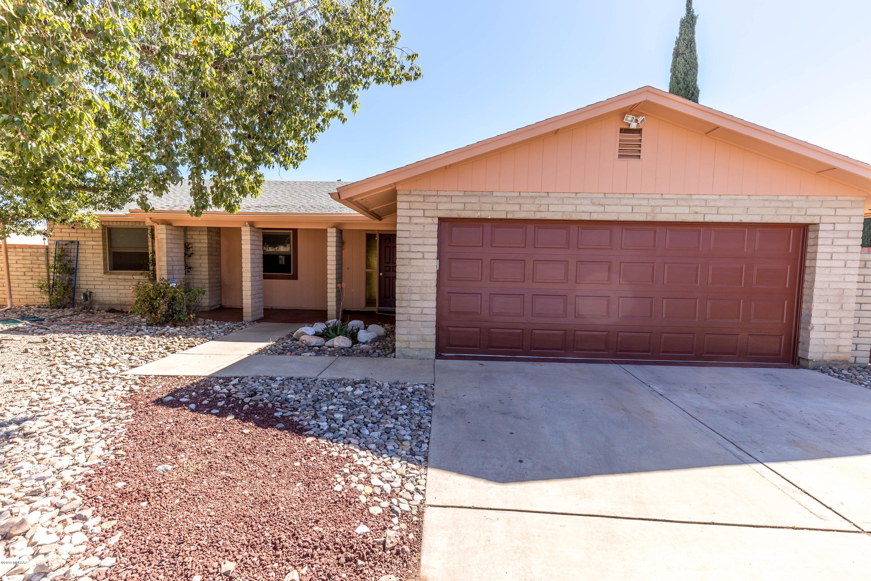 Beautiful Ranch style 3 bed 2 bath home with 2 car garage in East side Tucson.  New 12x24 easy care tile throughout. Ceiling fans in bedrooms , Dual pane energy efficient windows with built in mini blinds, Freshly painted, Extended patio cover with plenty of shade and area for entertaining. Storage shed in back yard that is walled in. Small dogs ok.