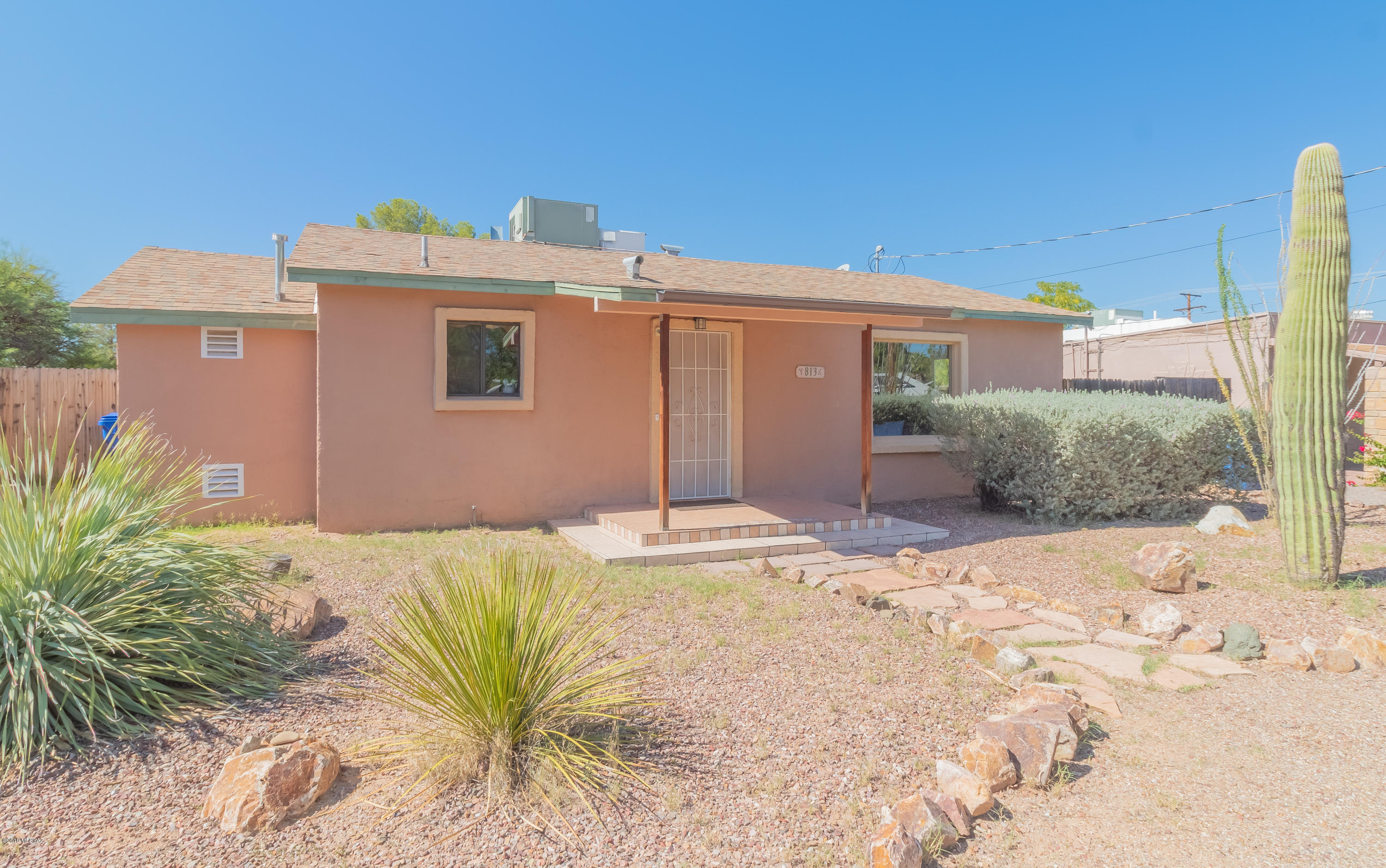 Seller will accept or counter offers from 179,900-184,900 Come see this lovely home located in central Tucson! This beautiful home greets you with a living room as soon as you walk in the door. The kitchen in this home boasts a white gas range as well as a white dishwasher along with its tiled countertops. Walking down the hallway you will an office/bedroom that leads you into the additional family room in the back of the home! In the family you will find plenty of space to have your friends and family over. The family room in the back is also equipped with its very own wood burning fireplace! Out in the back of the home you will find your very own storage shed.