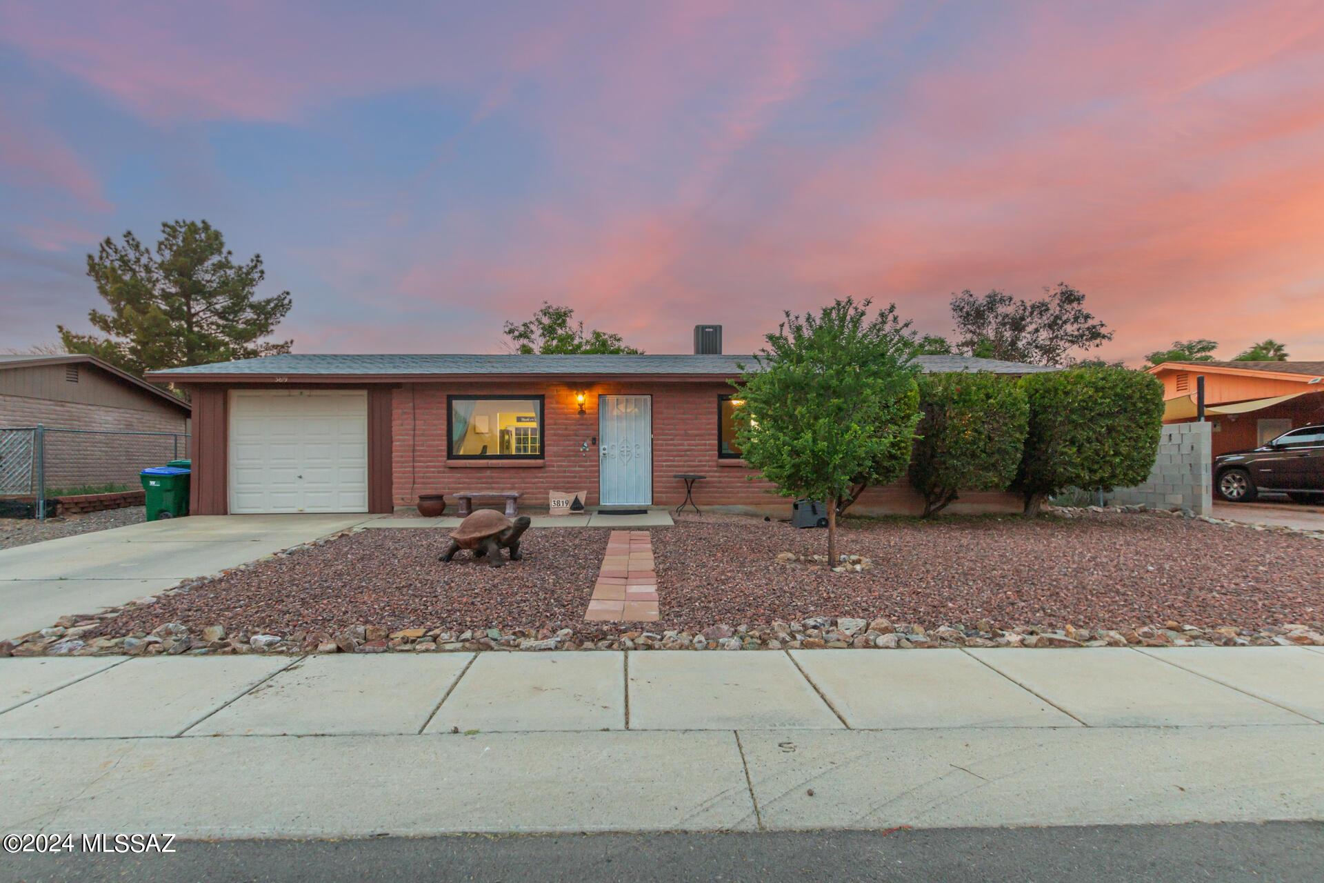 Discover this charming property featuring breathtaking mountain views with tons of updates. Step inside to a warm, cozy interior with tile flooring, recessed lighting, and a welcoming living room. Featuring NEW windows and NEW interior doors throughout. Perfect your culinary skills in a recently updated kitchen equipped with custom cabinets, NEW stainless steel appliances, and plentiful counter space. The main bedroom offers a calming color palette and a private bathroom for ultimate relaxation. Outside, the spacious backyard includes a covered patio, large faux barn shed for a workshop or storage, play area, and ample space for a pool or creative landscaping. This delightful home is ready for you to create lasting memories!  NO HOA!